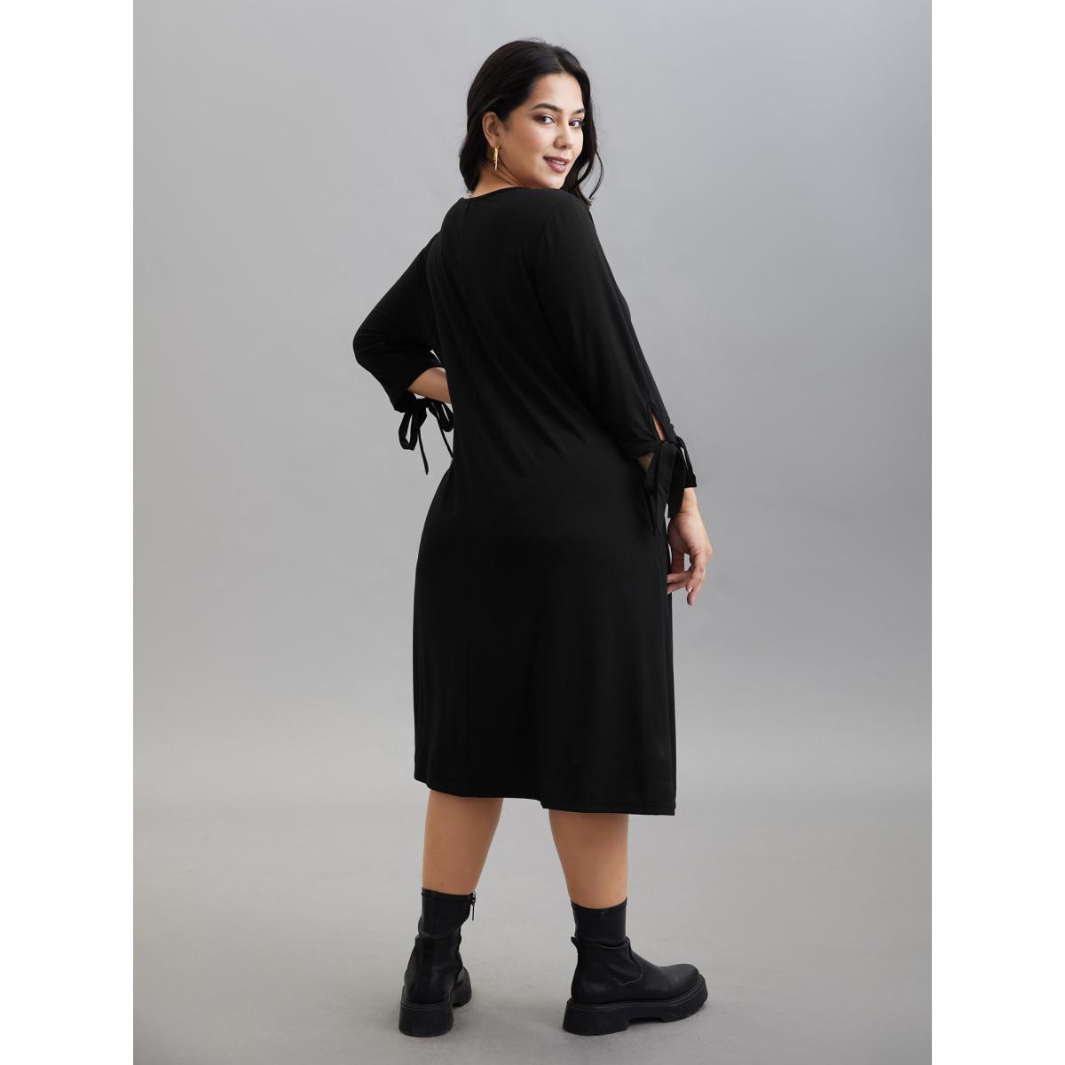 Plus Size Color Block Tie-Knot Fitted Midi Dress Black Women Casual Tie knot Knit Dresses Bloomchic 14-16/1X Product Image