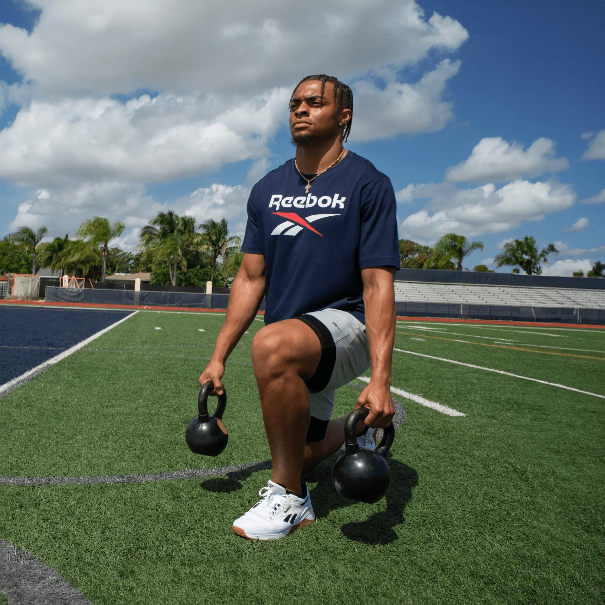 Men's Reebok Identity Big Stacked Logo T-Shirt Male Product Image