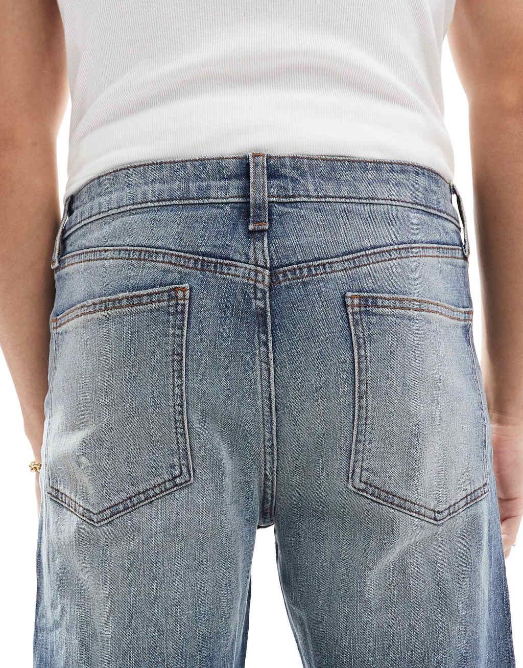 ASOS DESIGN straight stretch jeans in dark wash blue Product Image