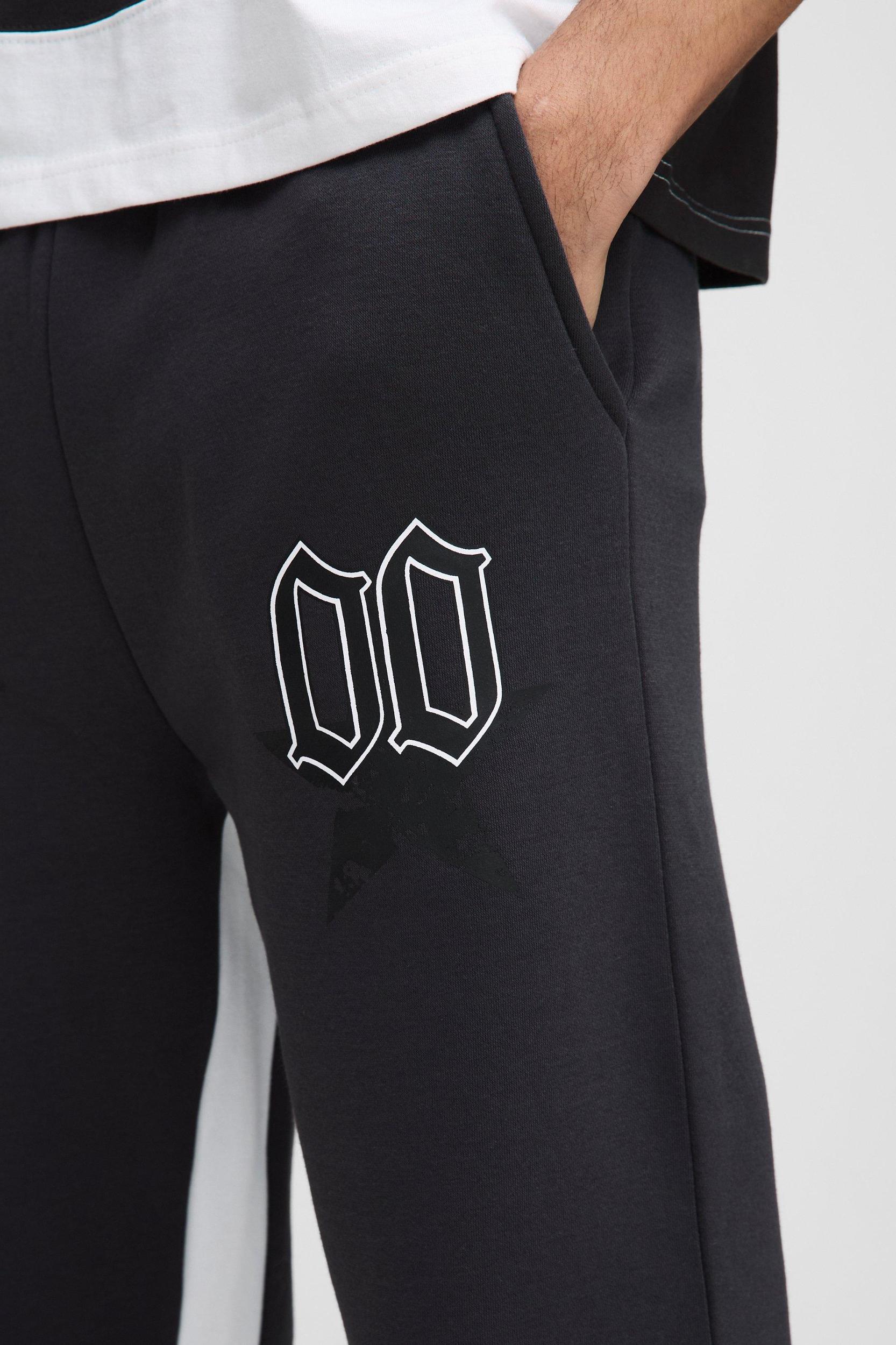 Relaxed Flare Star Limited Printed Varsity Gusset Sweatpants | boohooMAN USA Product Image