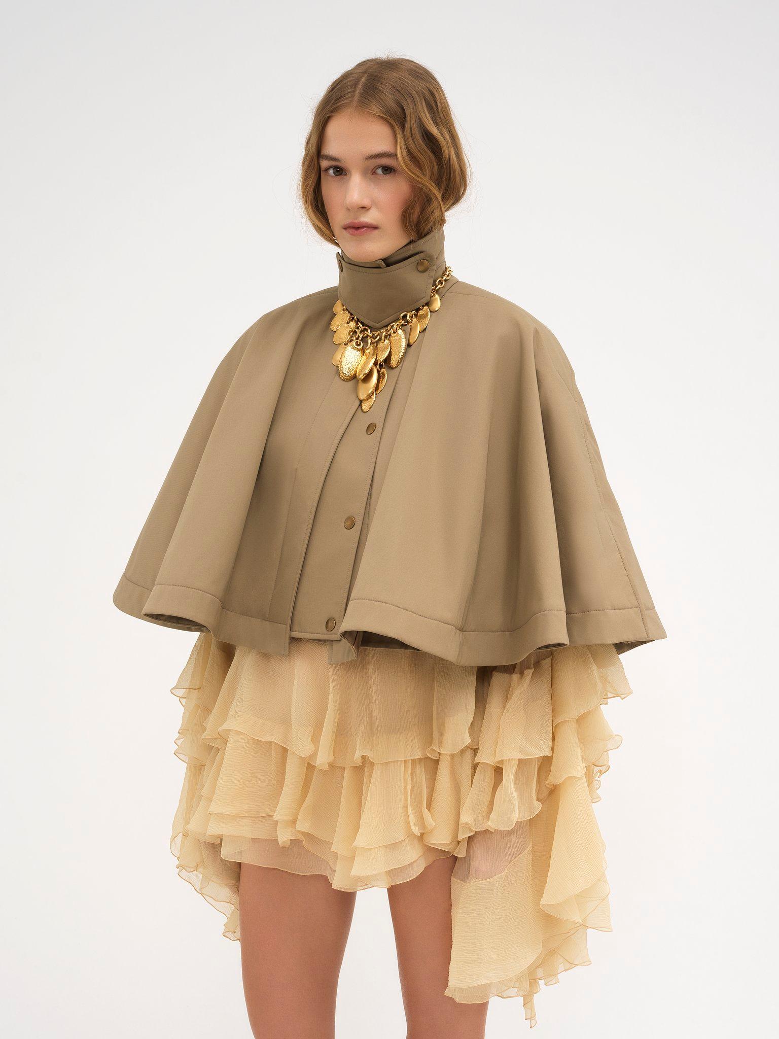 Short quilted cape in cotton gabardine Product Image