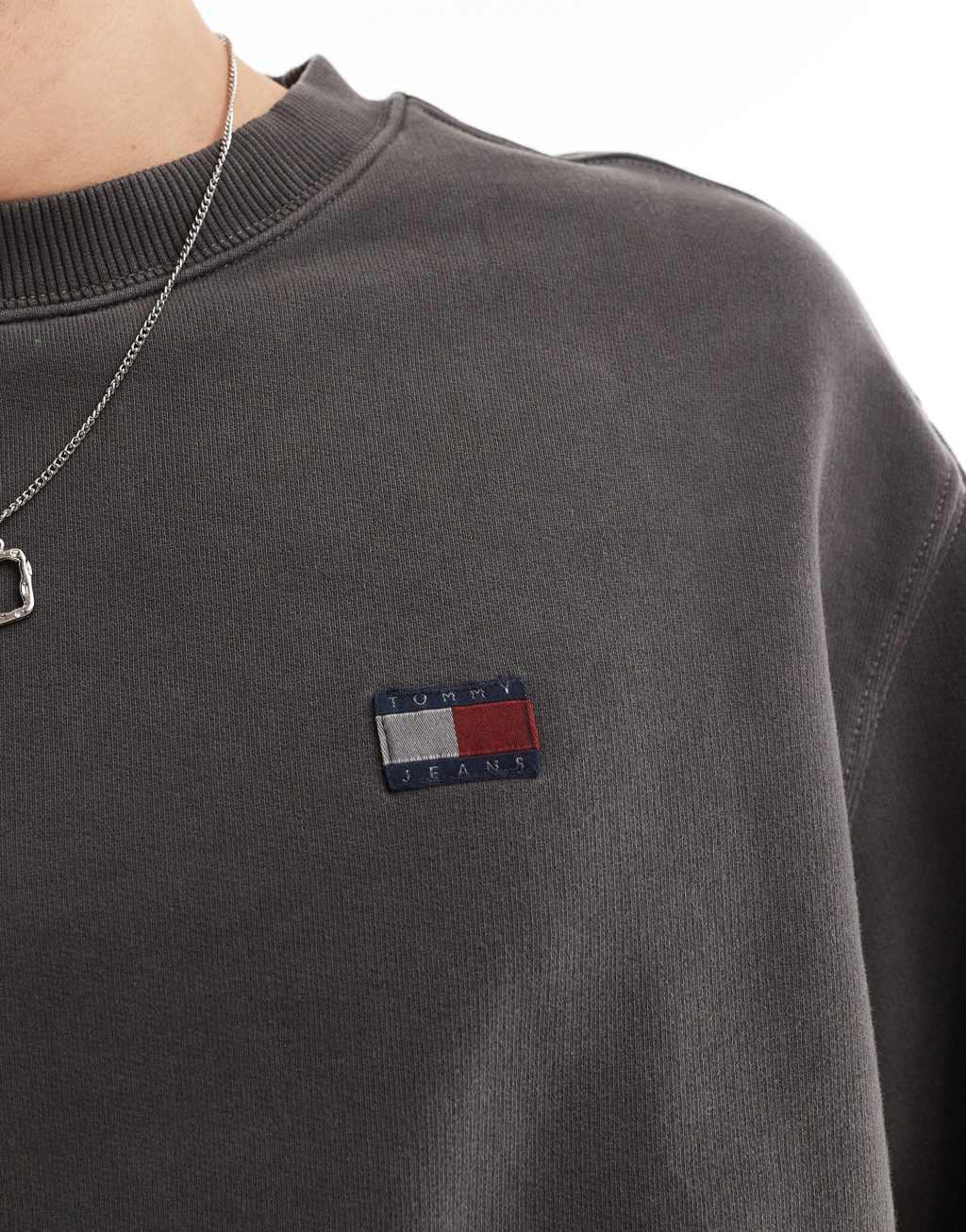 Tommy Jeans badge sweatshirt in washed black Product Image