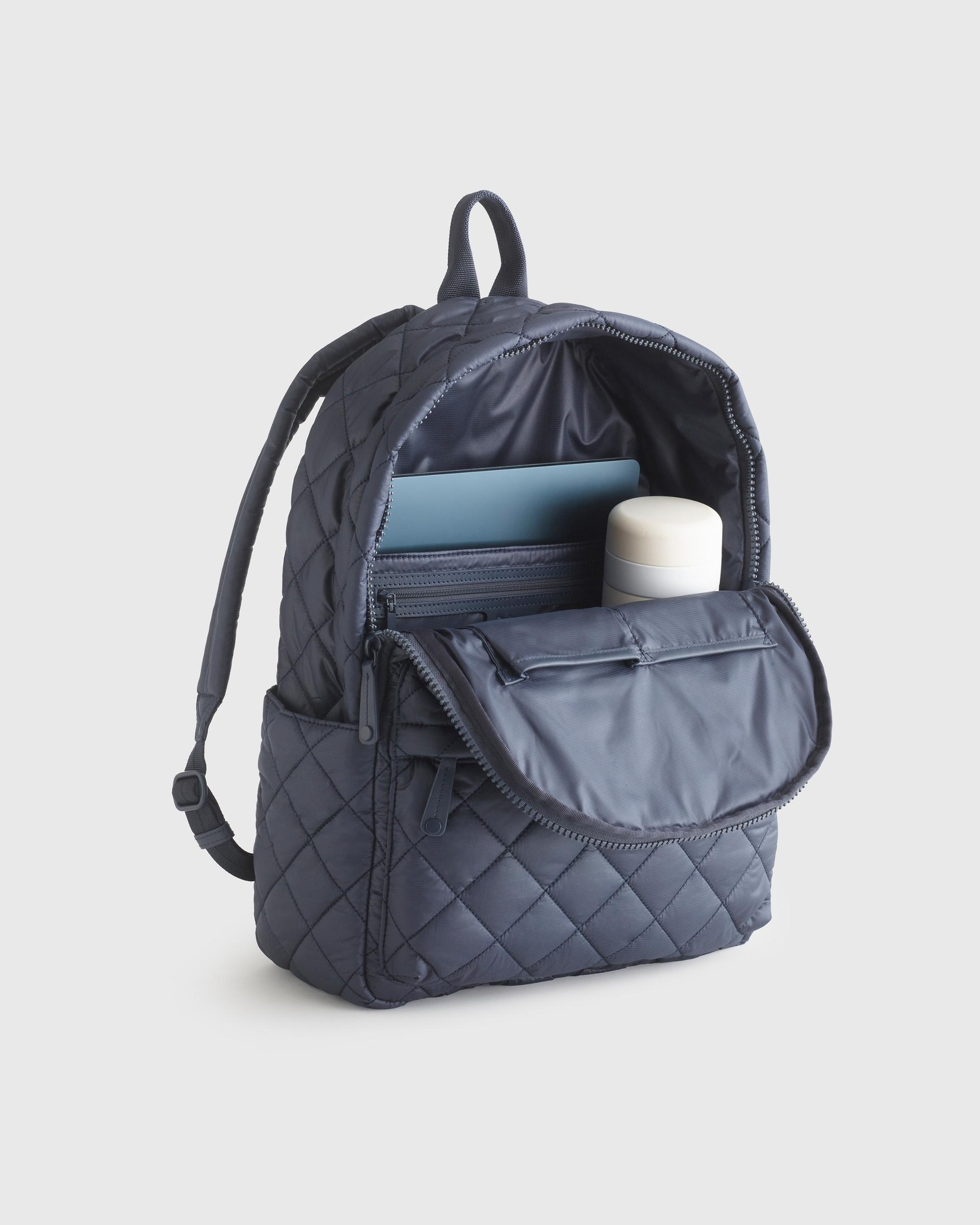 Quince | Women's Transit Quilted Commuter Backpack in Navy, Nylon Product Image