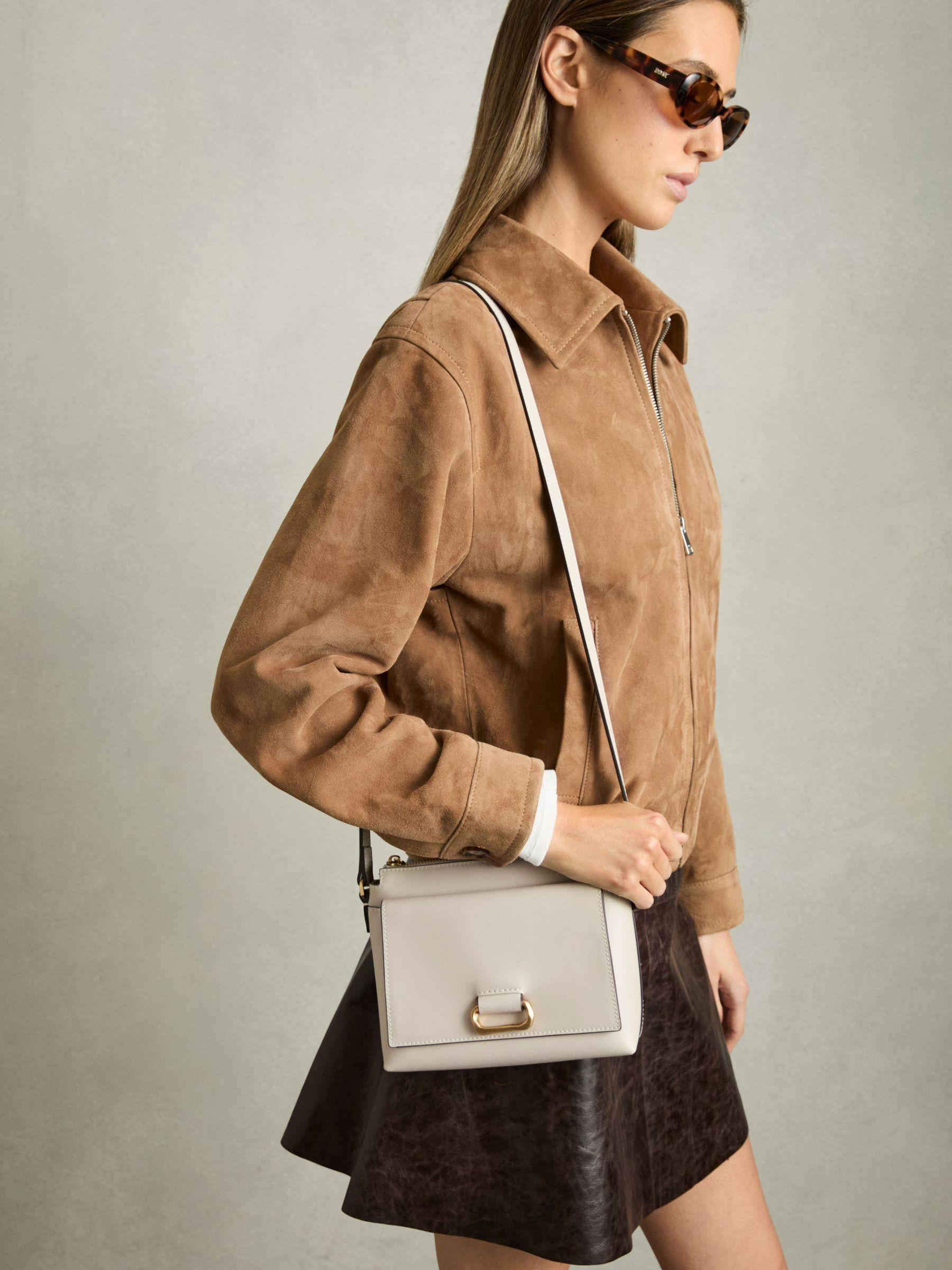 Leather Sculpted-Hardware Cross-Body Bag in Off White Product Image