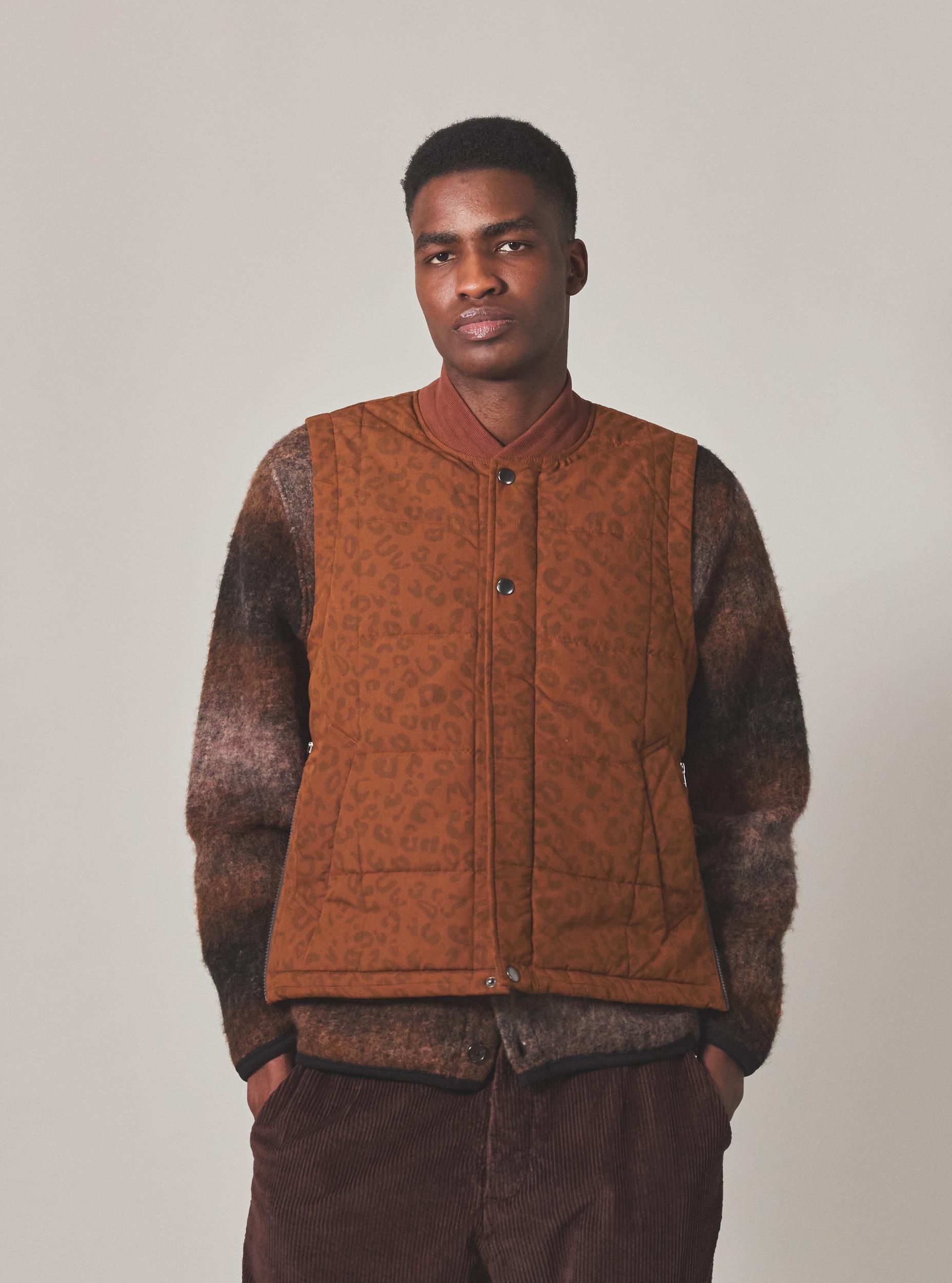 Universal Works Carlton Gilet in Orange Leopard Recycled Polytech Product Image