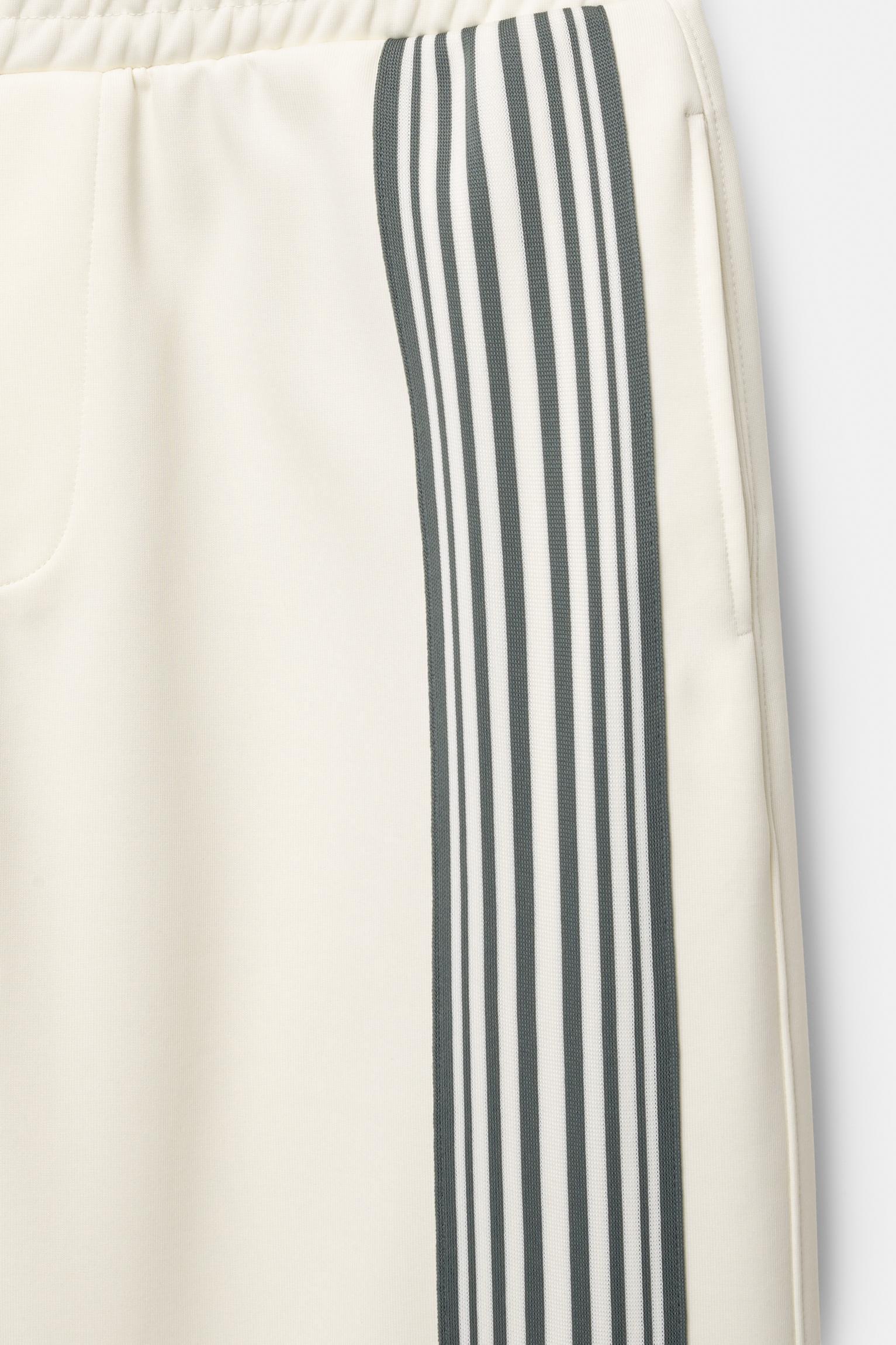 STWD tracksuit bottoms with side stripes Product Image