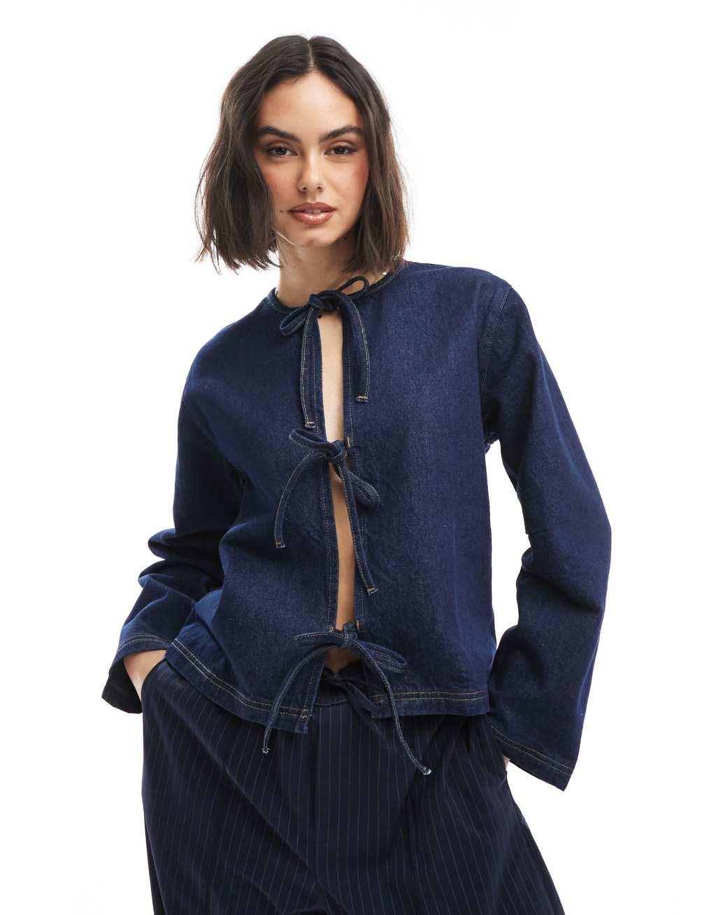 ASOS DESIGN denim long sleeve tie front top with contrast stitching in indigo Product Image