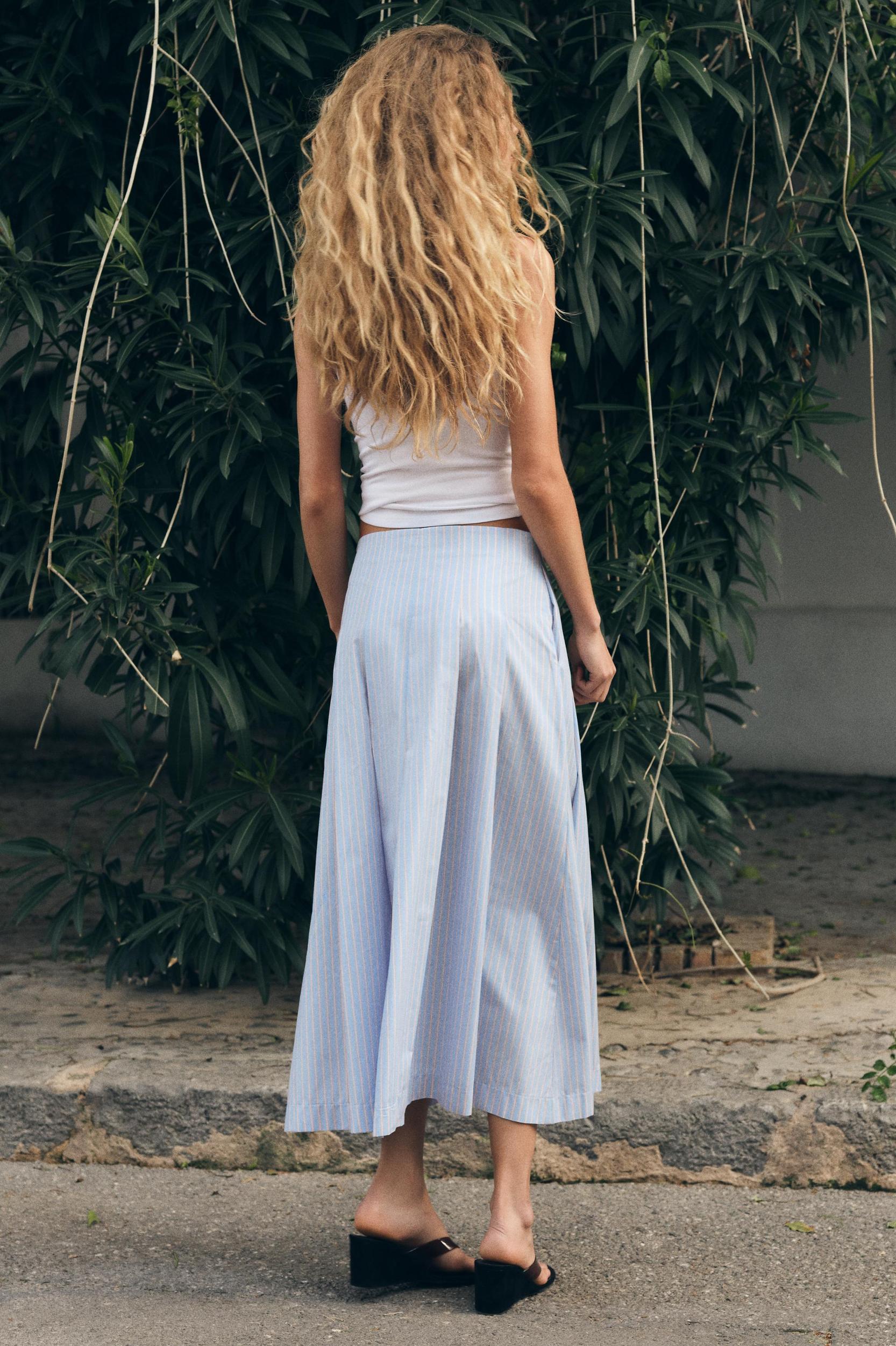 PLEATED STRIPED MIDI SKIRT Product Image