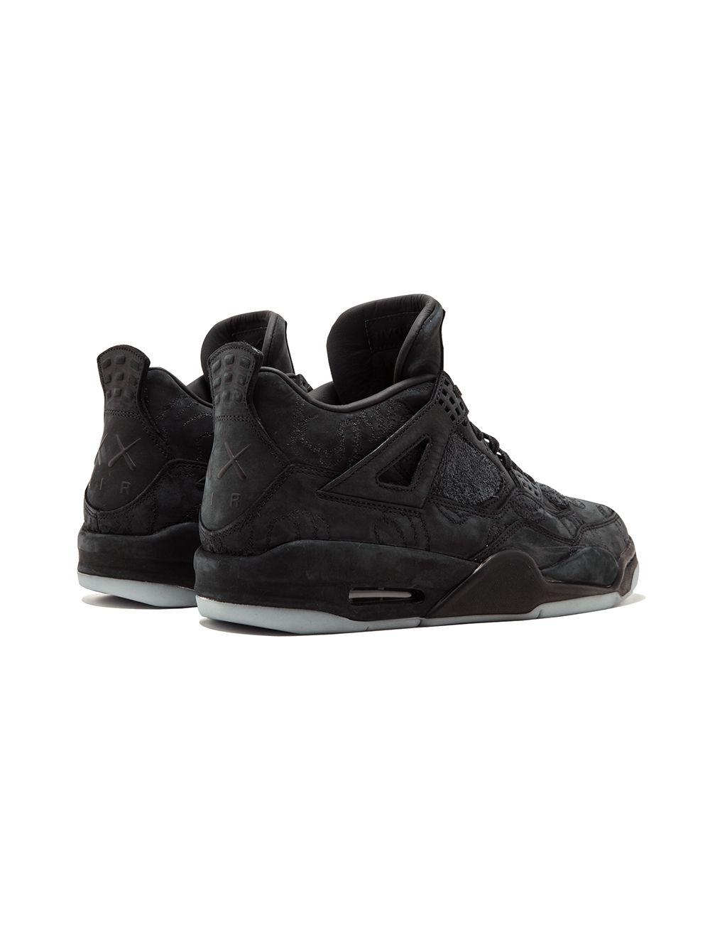 x Kaws Air Jordan 4 Retro "Black" sneakers Product Image