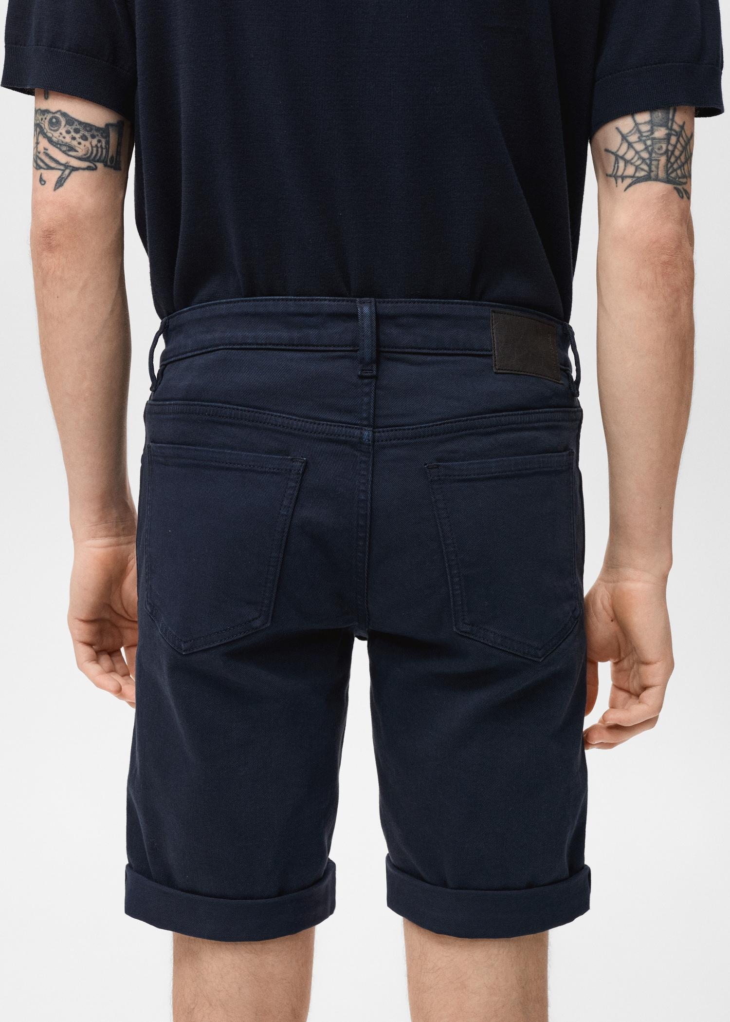 Slim-fit denim bermuda shorts - Men | MANGO USA Product Image