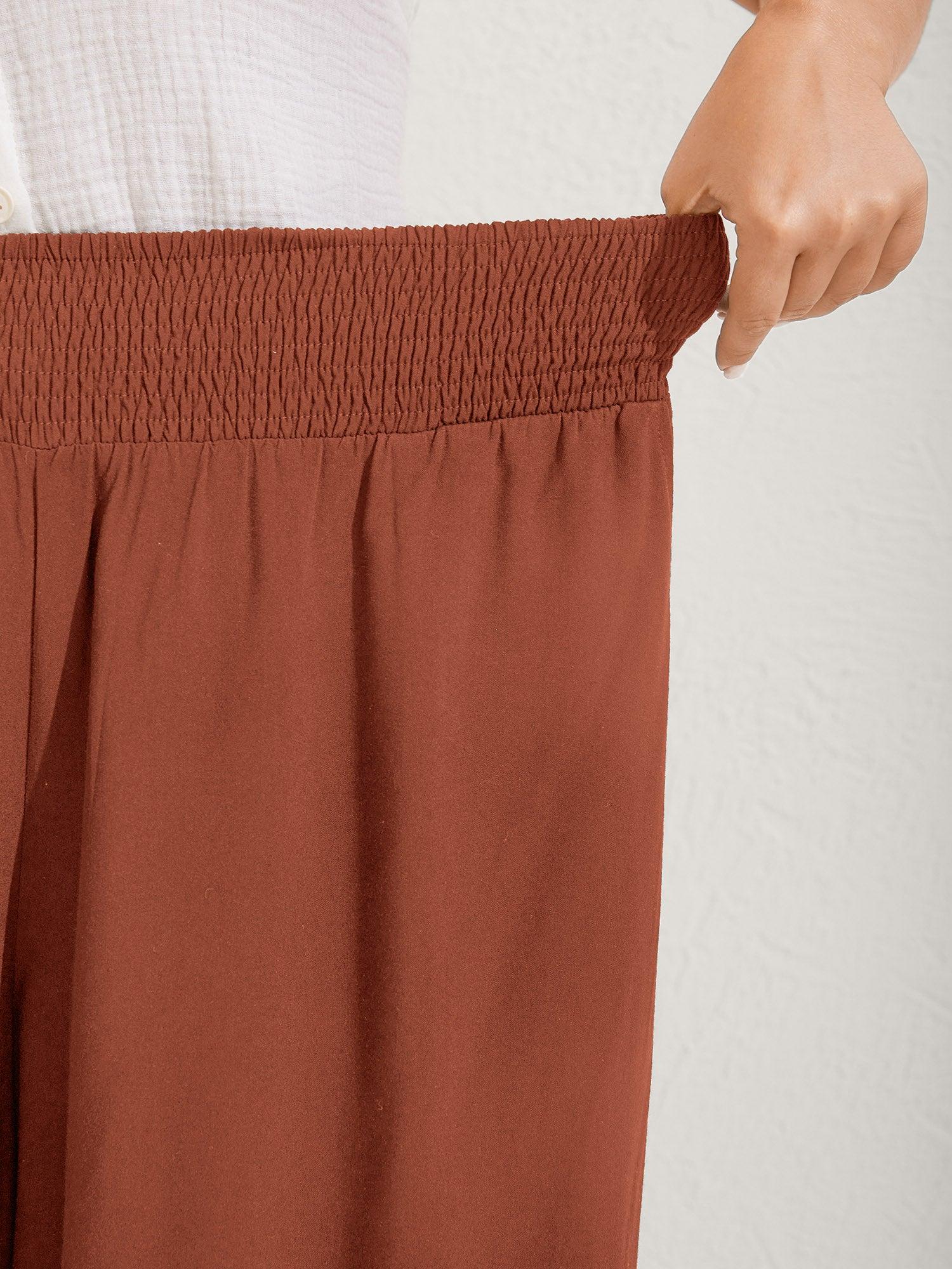 Ruffled Curvy Hem Wide-Leg Pants Female Product Image