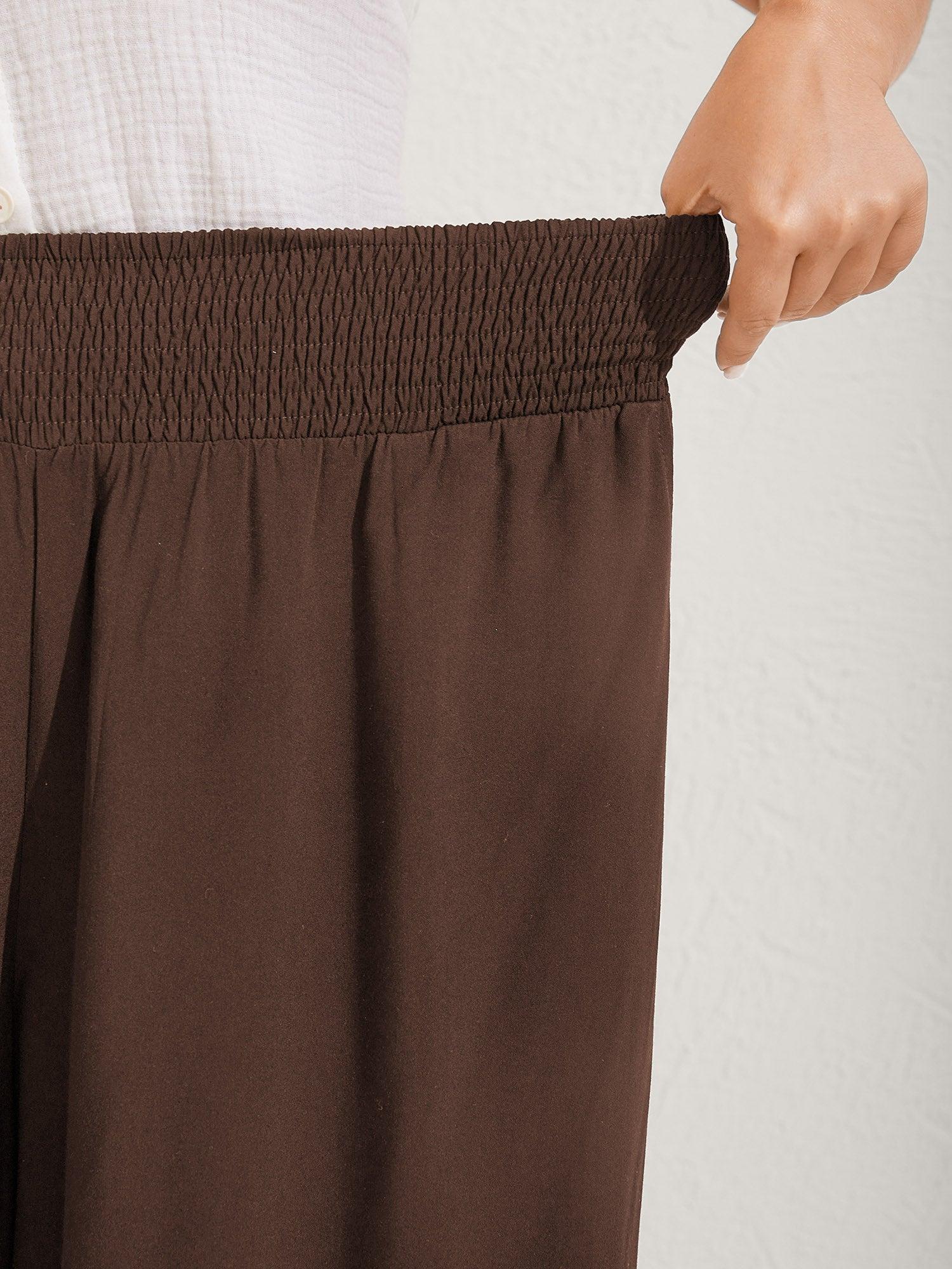 Ruffled Curvy Hem Wide-Leg Pants Female Product Image
