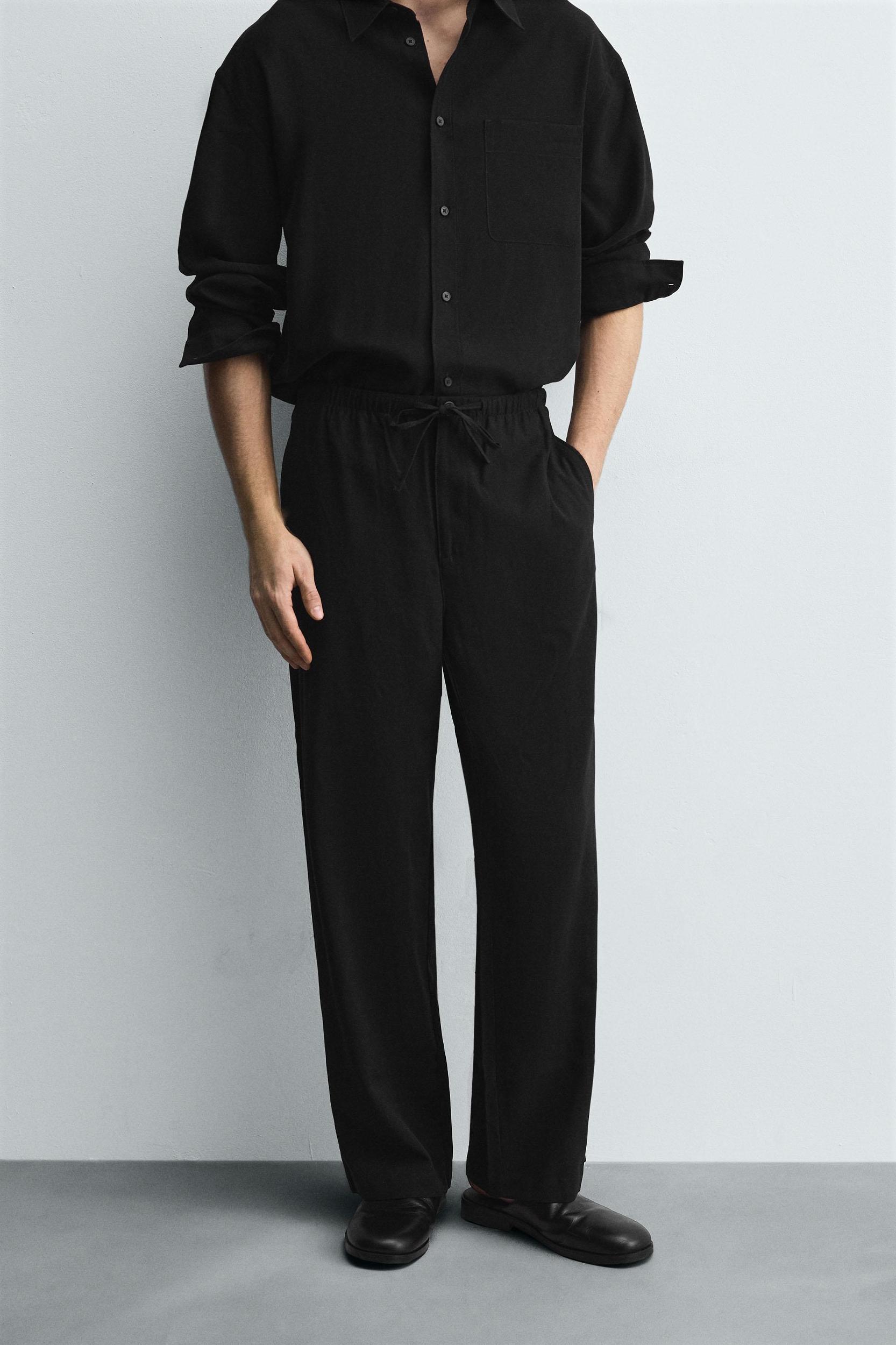 RELAXED FIT FLOWY PANTS Product Image