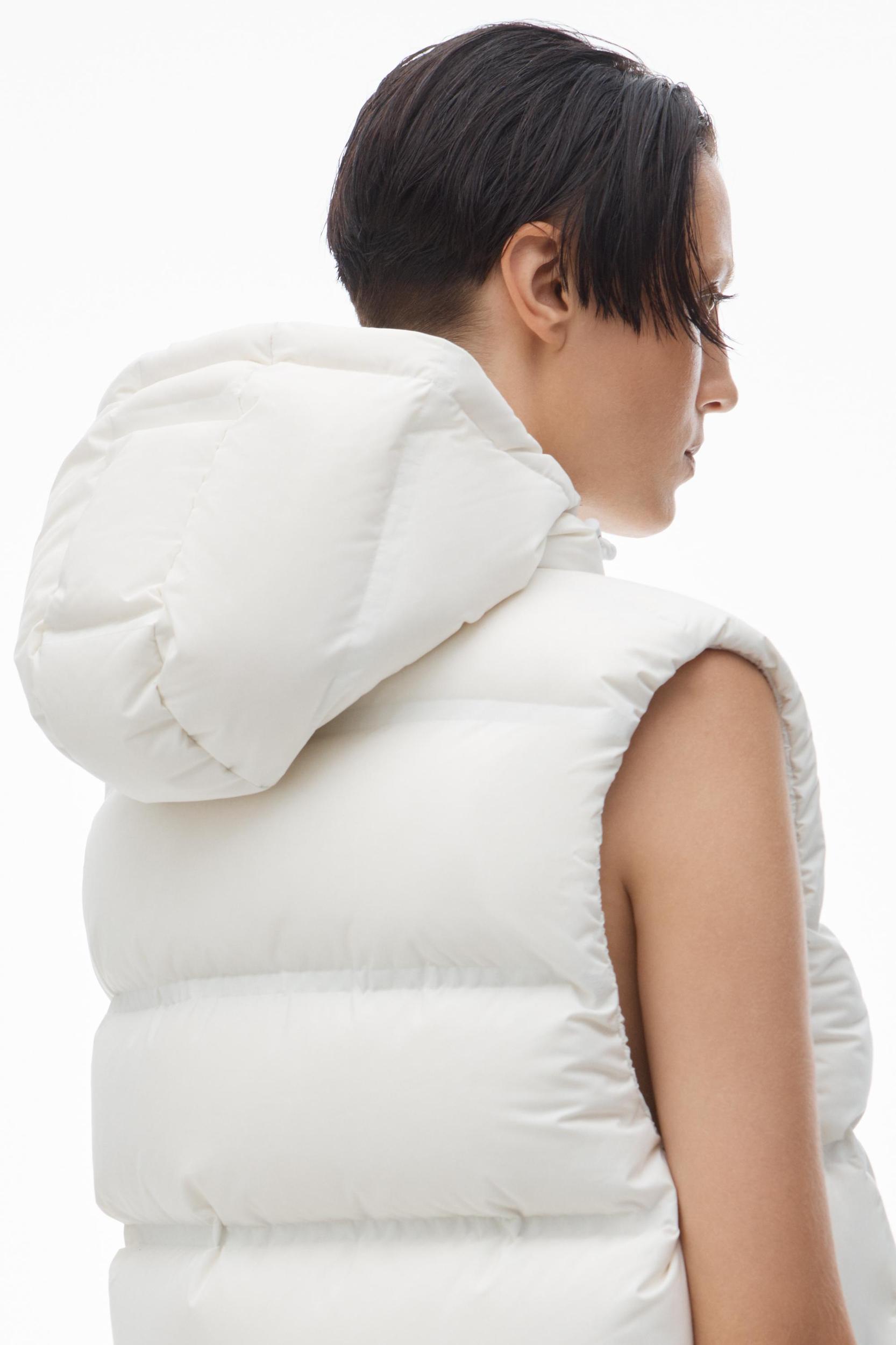 Cropped Hooded Puffer Vest With Reflective Logo Product Image