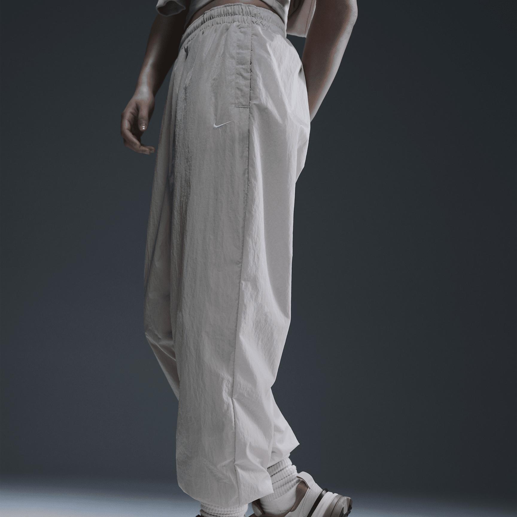 Women's Nike Sportswear Essential Mid-Rise Oversized Woven Jogger Pants Product Image