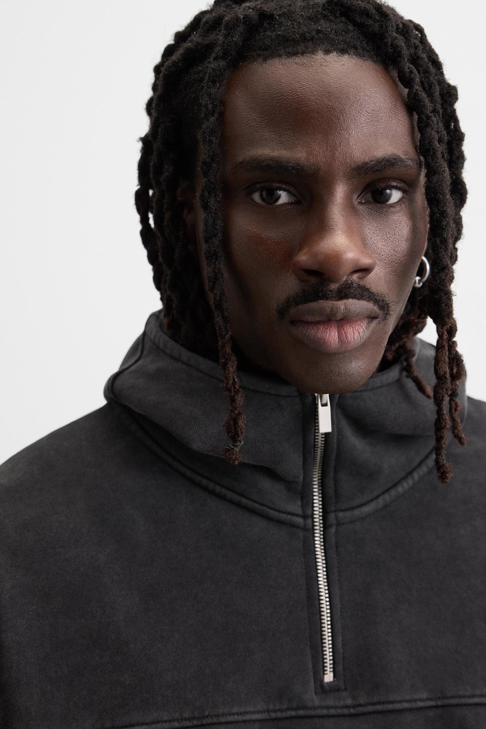 WASHED QUARTER-ZIP HOODIE Product Image