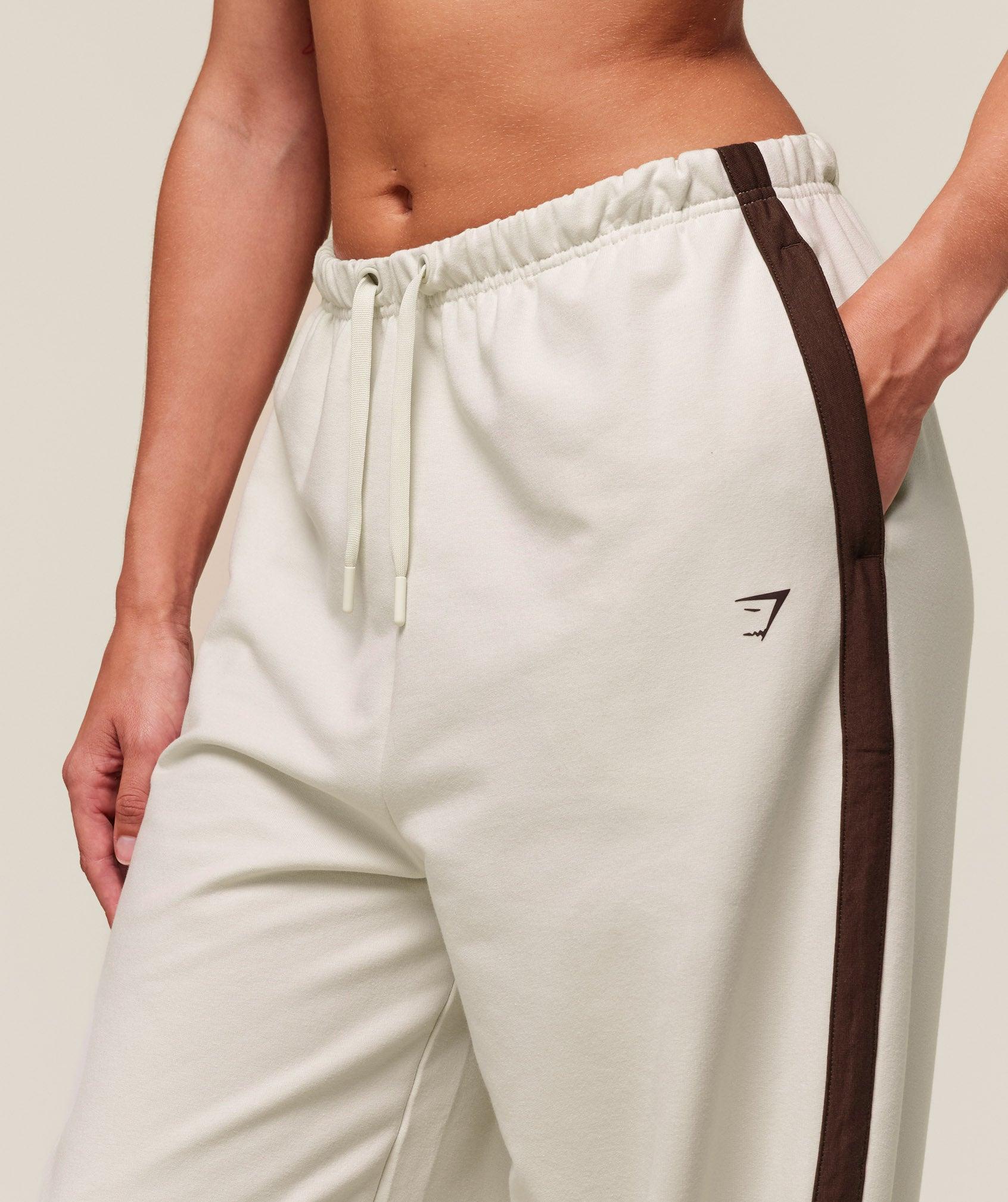Gymshark Retro Stripe Snap Pant - Oat White/Archive Brown Female Product Image