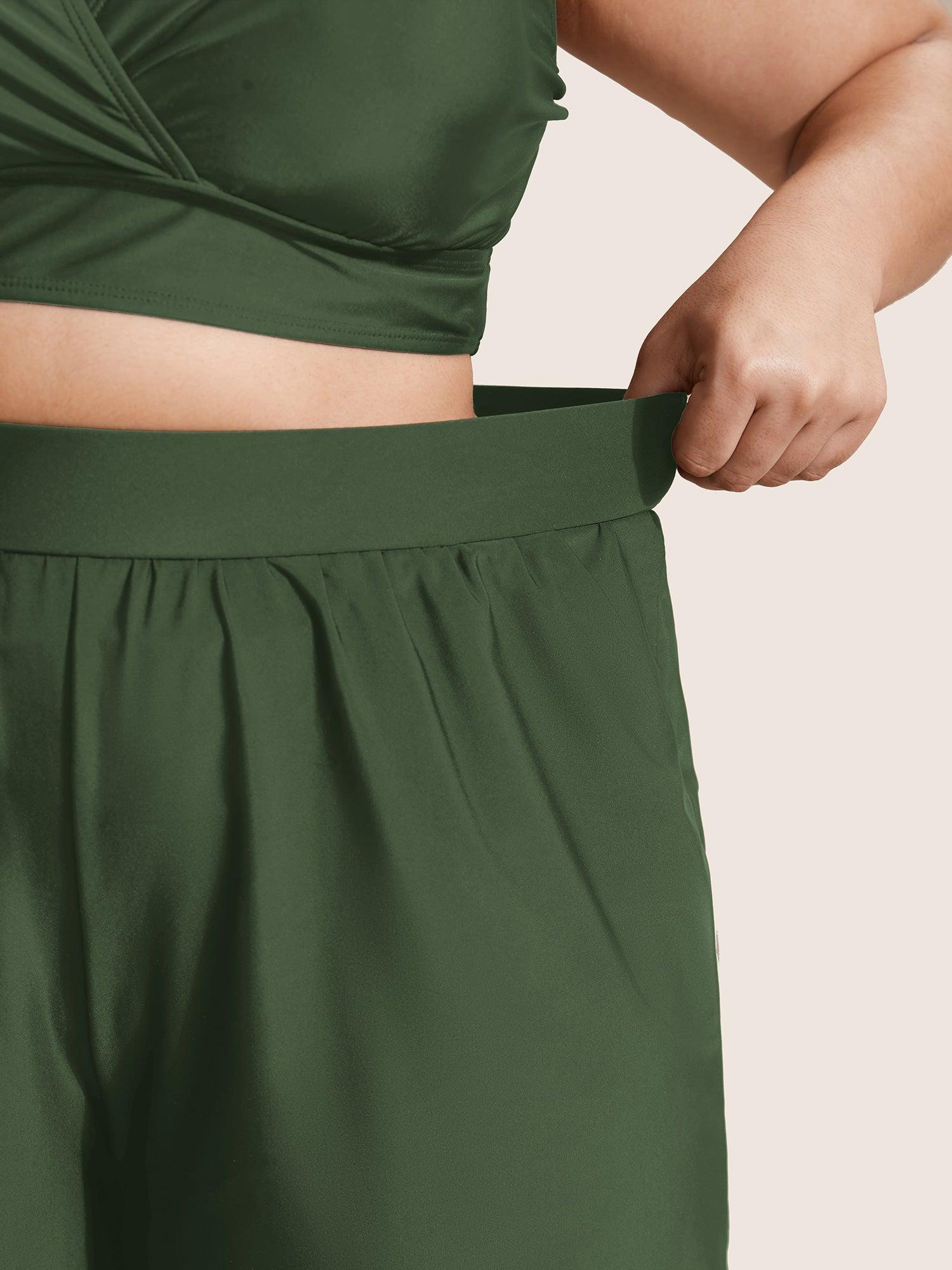 High Waisted Pockets Solid Pleated Swim Bottom Female Product Image