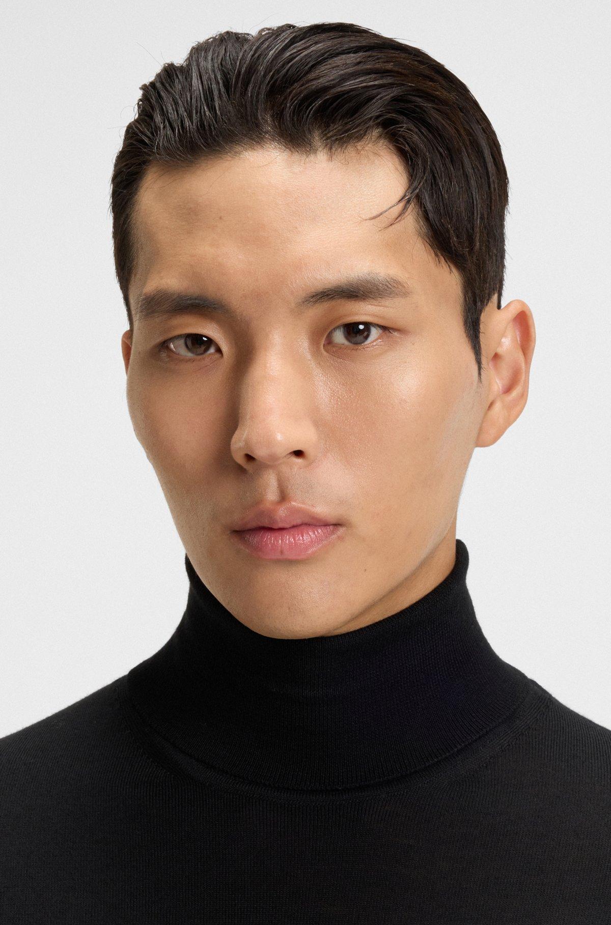 Merino-wool rollneck sweater in a slim fit Product Image