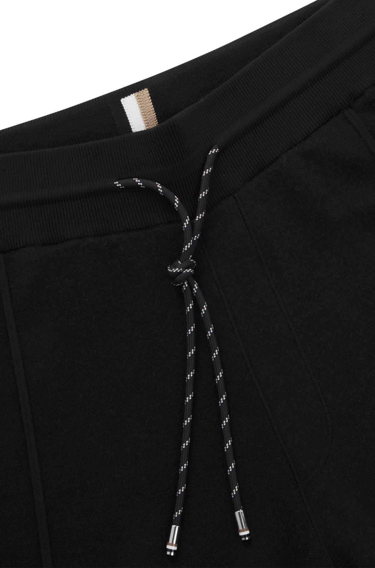 Regular-fit trousers in wool with zip hems Product Image