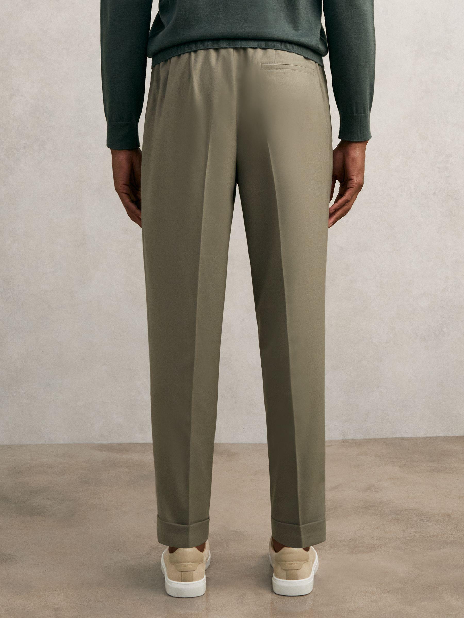 Relaxed-Fit Pleated Tapered Trousers in Sage Product Image
