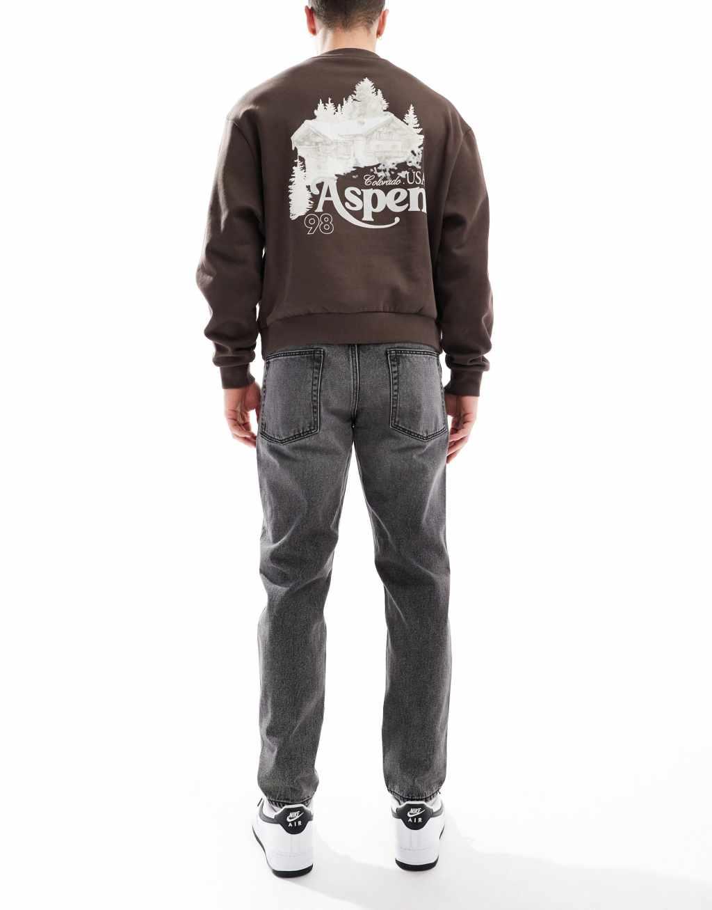 ASOS DESIGN tapered jeans in washed black Product Image