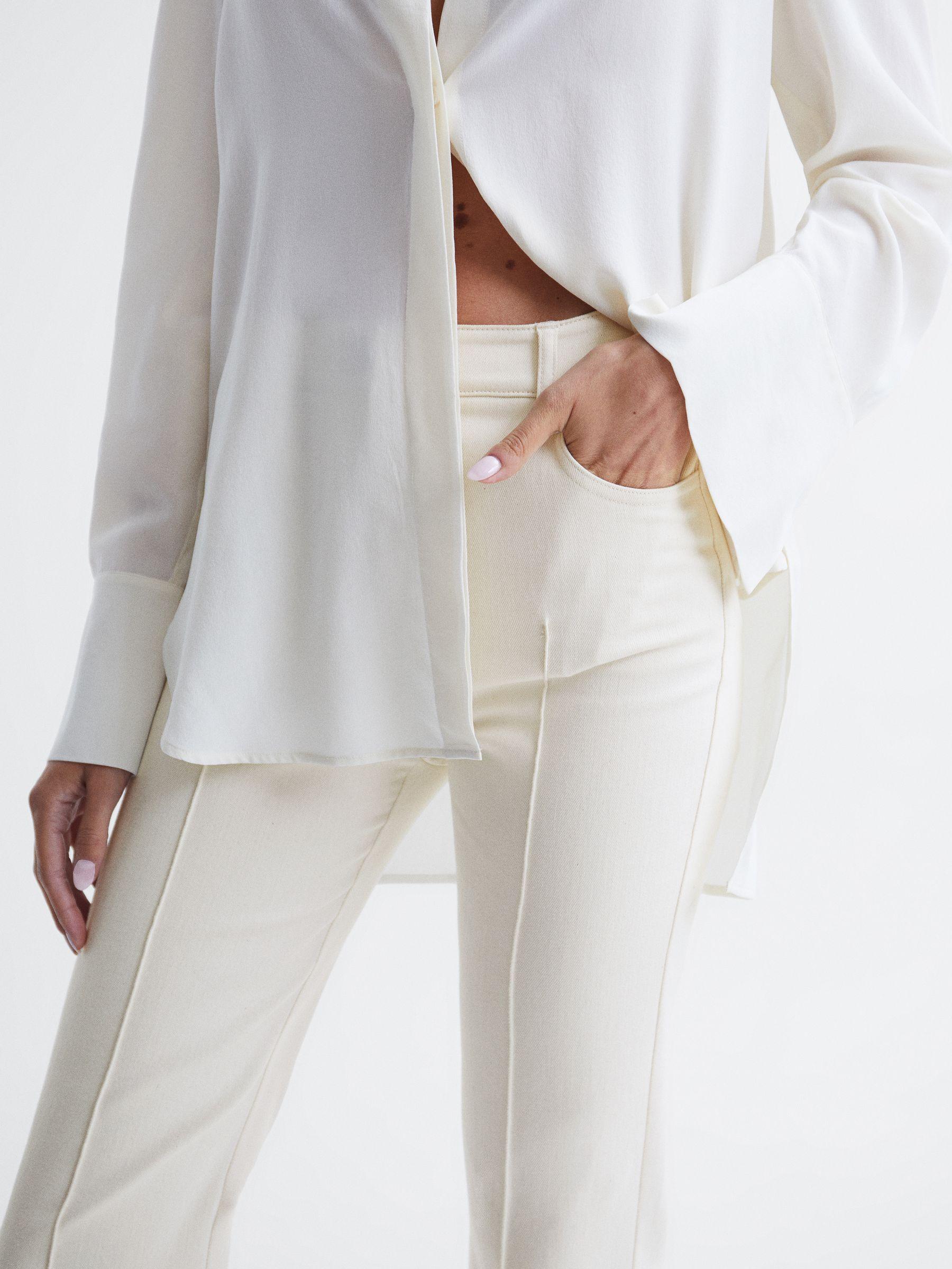 High Rise Flared Trousers in Cream Product Image