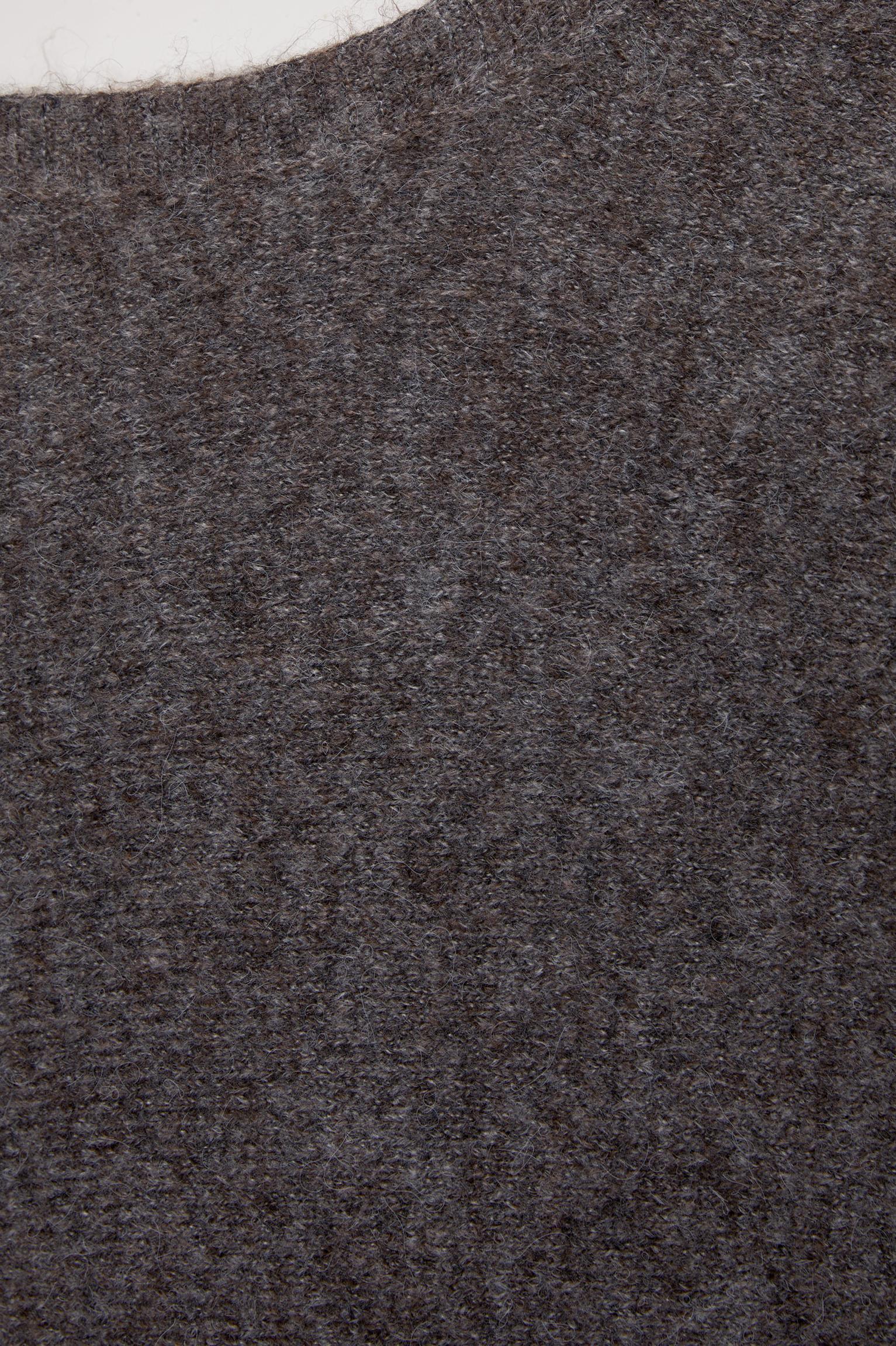 Asymmetric soft knit sweater Product Image