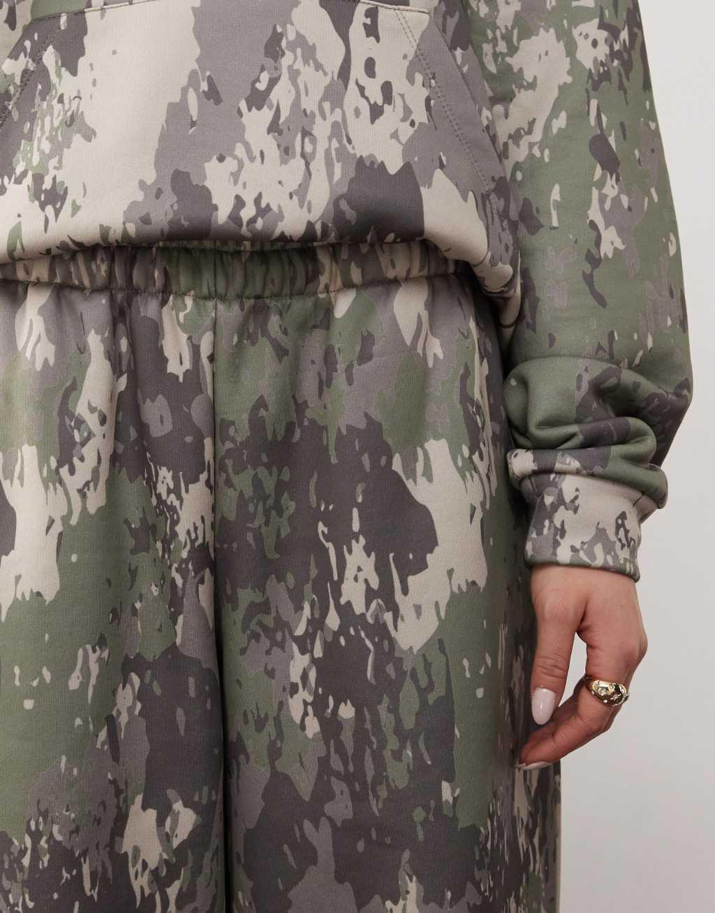 COLLUSION relaxed sweatpants in green camo Product Image