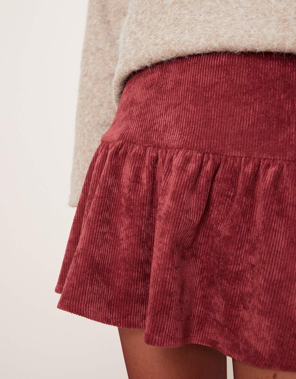 ASOS DESIGN flippy cord mini skirt in burgundy Product Image