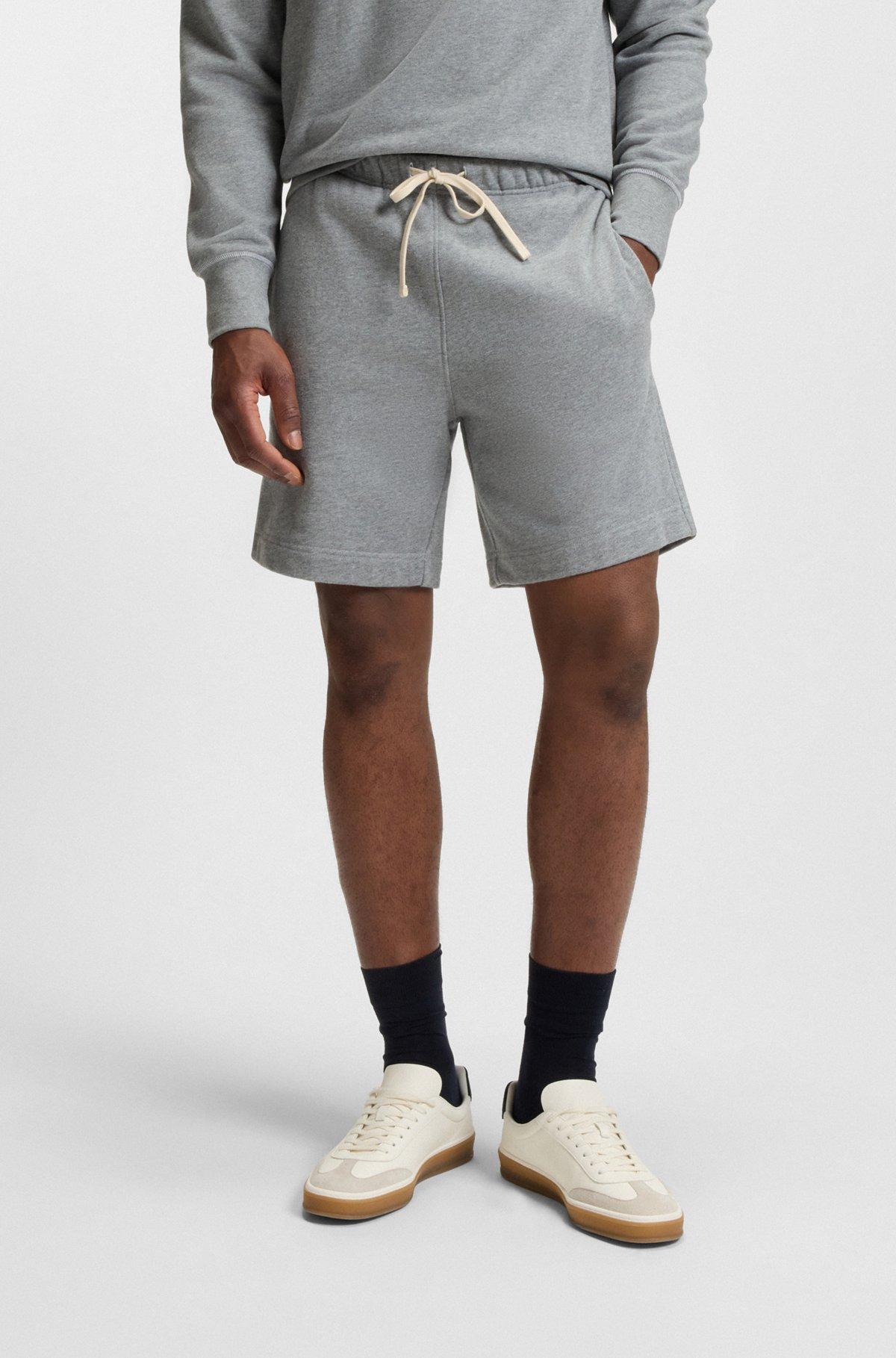 BOSS - BECKHAM x BOSS oversized-fit shorts in cotton terry - Black Product Image