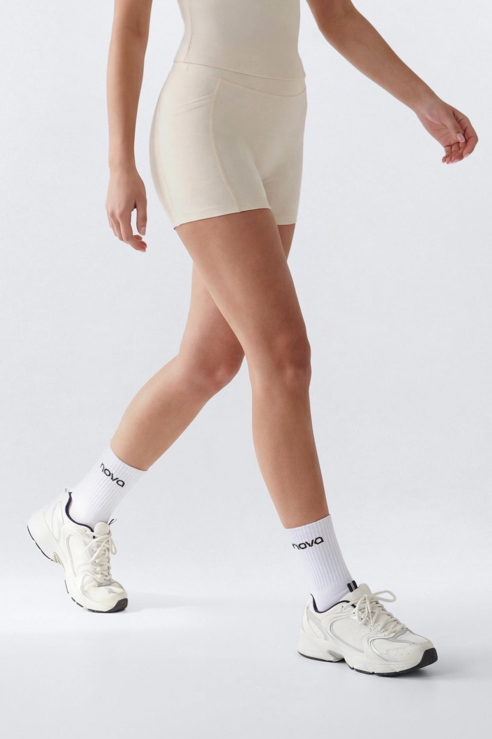 CloudForm™ 18″ Midrise Capri Legging - Beige Female Product Image