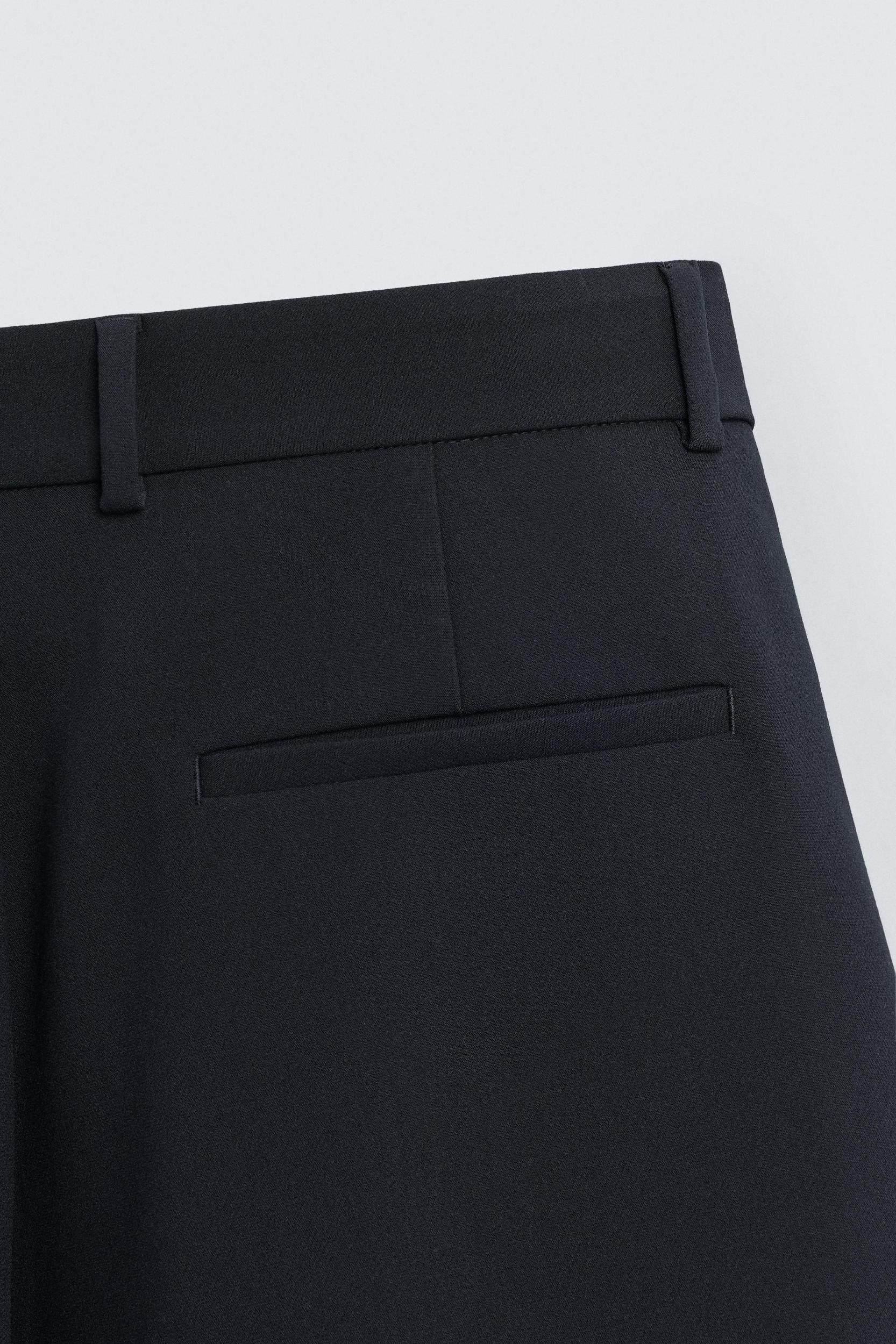 RELAXED FIT PLEATED PANTS Product Image