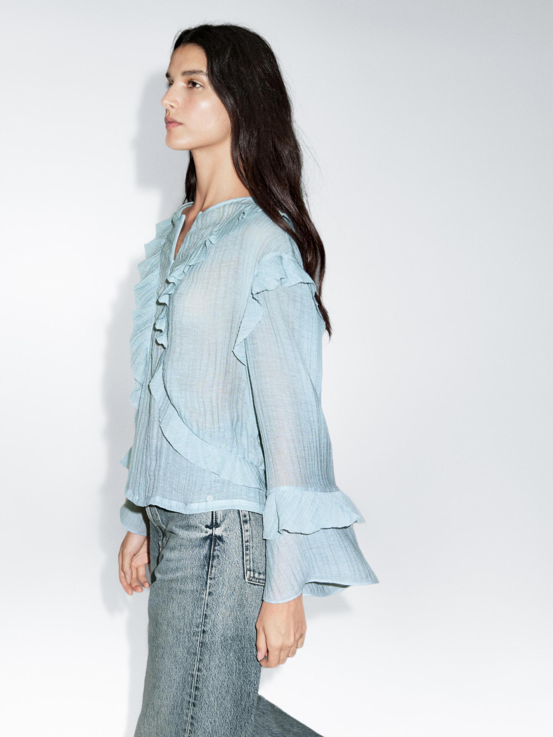Flowing blouse with ruffles Product Image