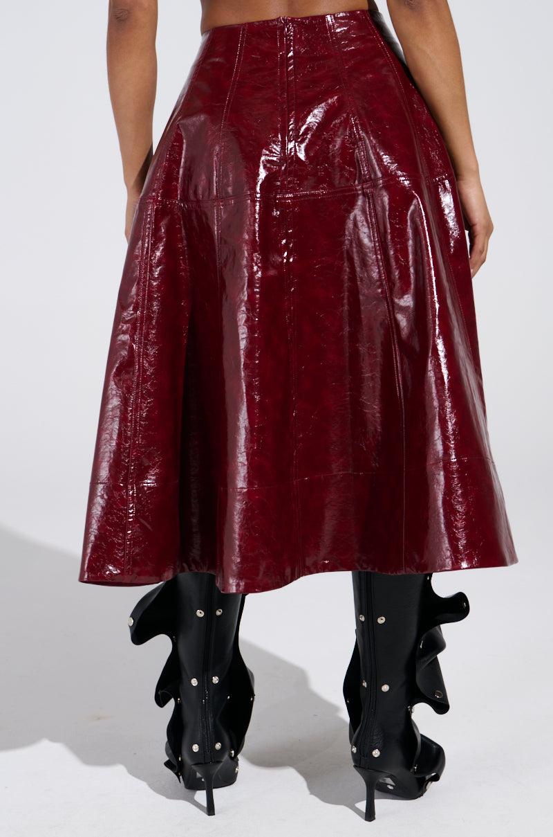 THINK ABOUT IT FAUX LEATHER MIDI SKIRT IN BURGUNDY Product Image