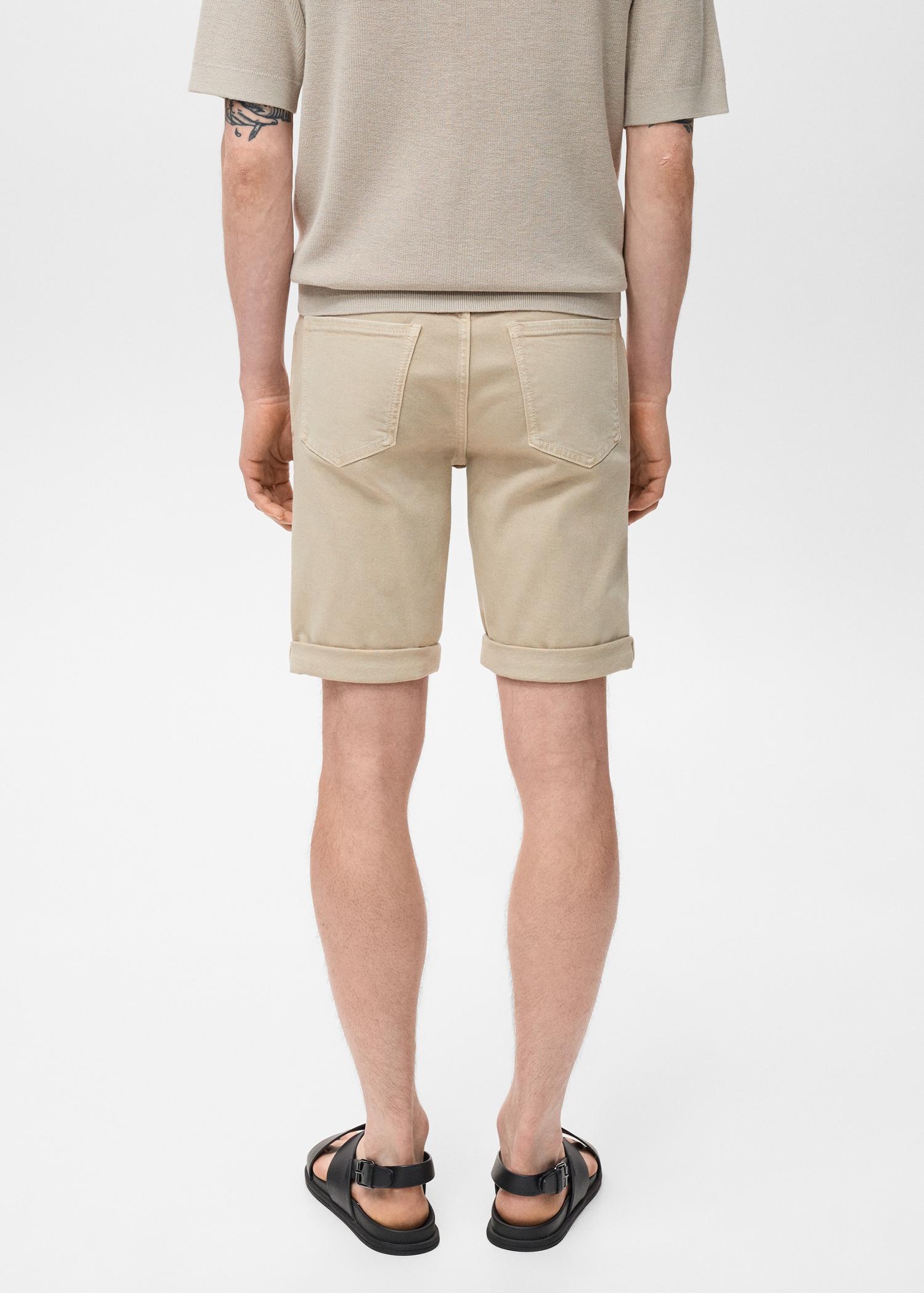 Slim-fit denim bermuda shorts - Men | MANGO USA Product Image