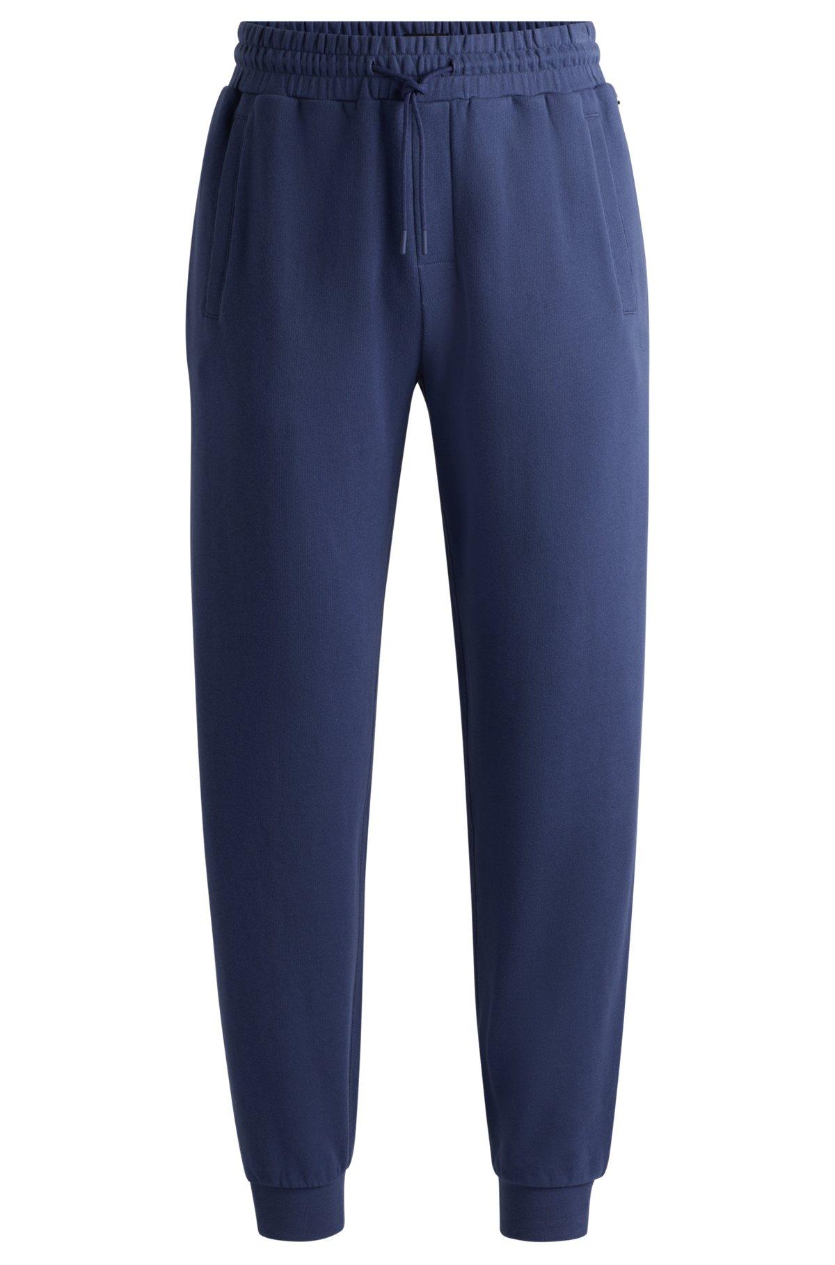 Cotton-terry tracksuit bottoms with flocked logo Product Image