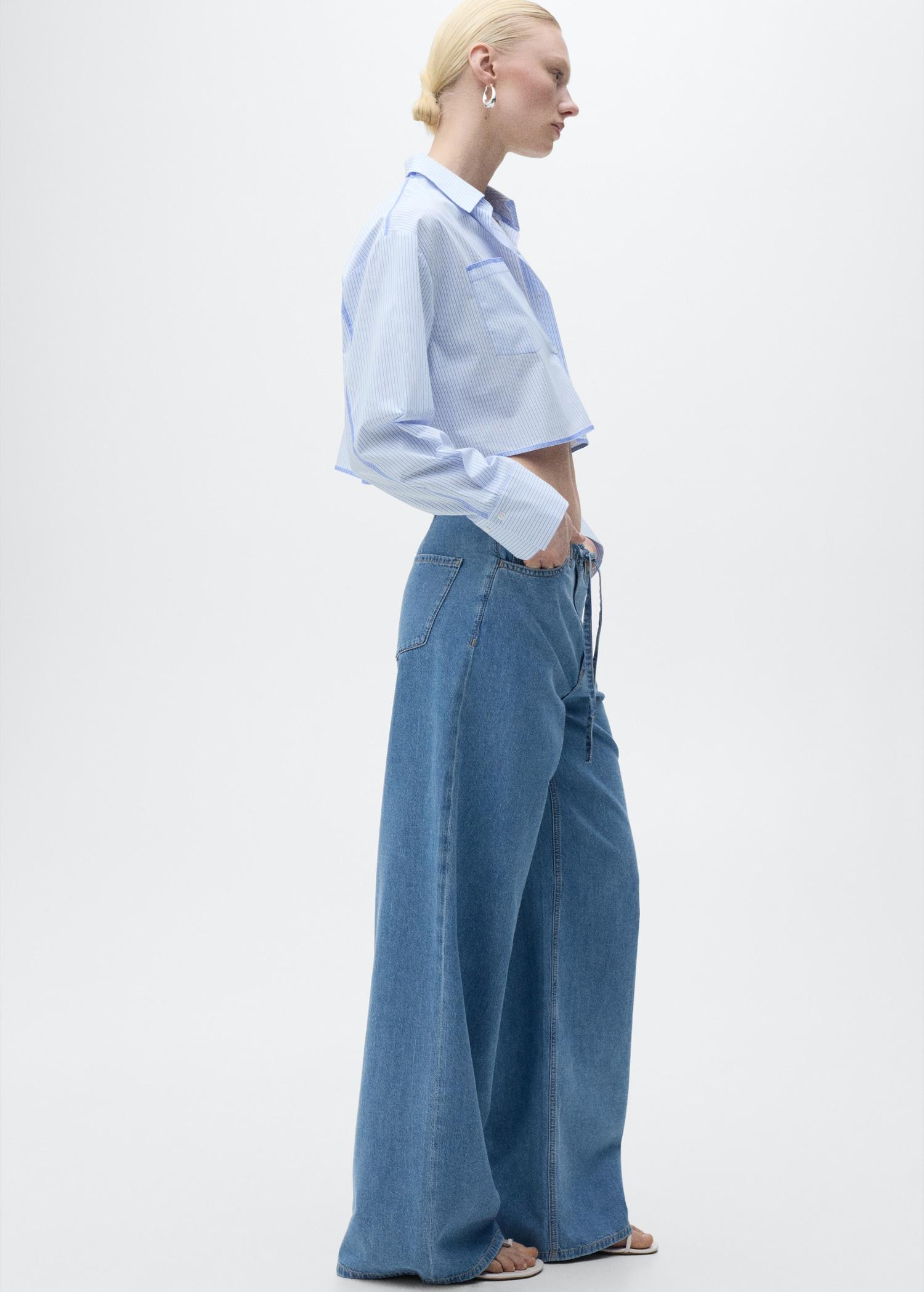 Wide-leg denim pants with belt - Women | MANGO USA Product Image