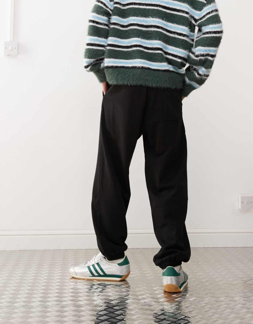 Weekday oversized sweatpants in black Product Image