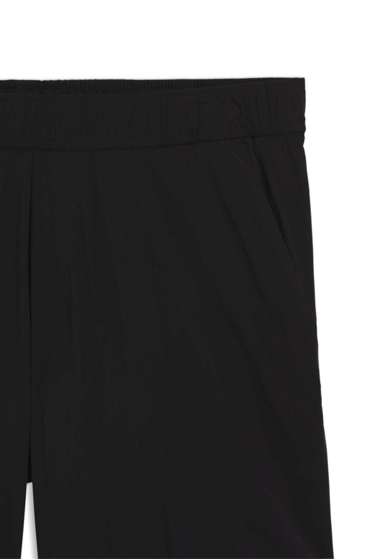 BOSS - Active double-layer shorts in quick-dry fabric - Black Product Image