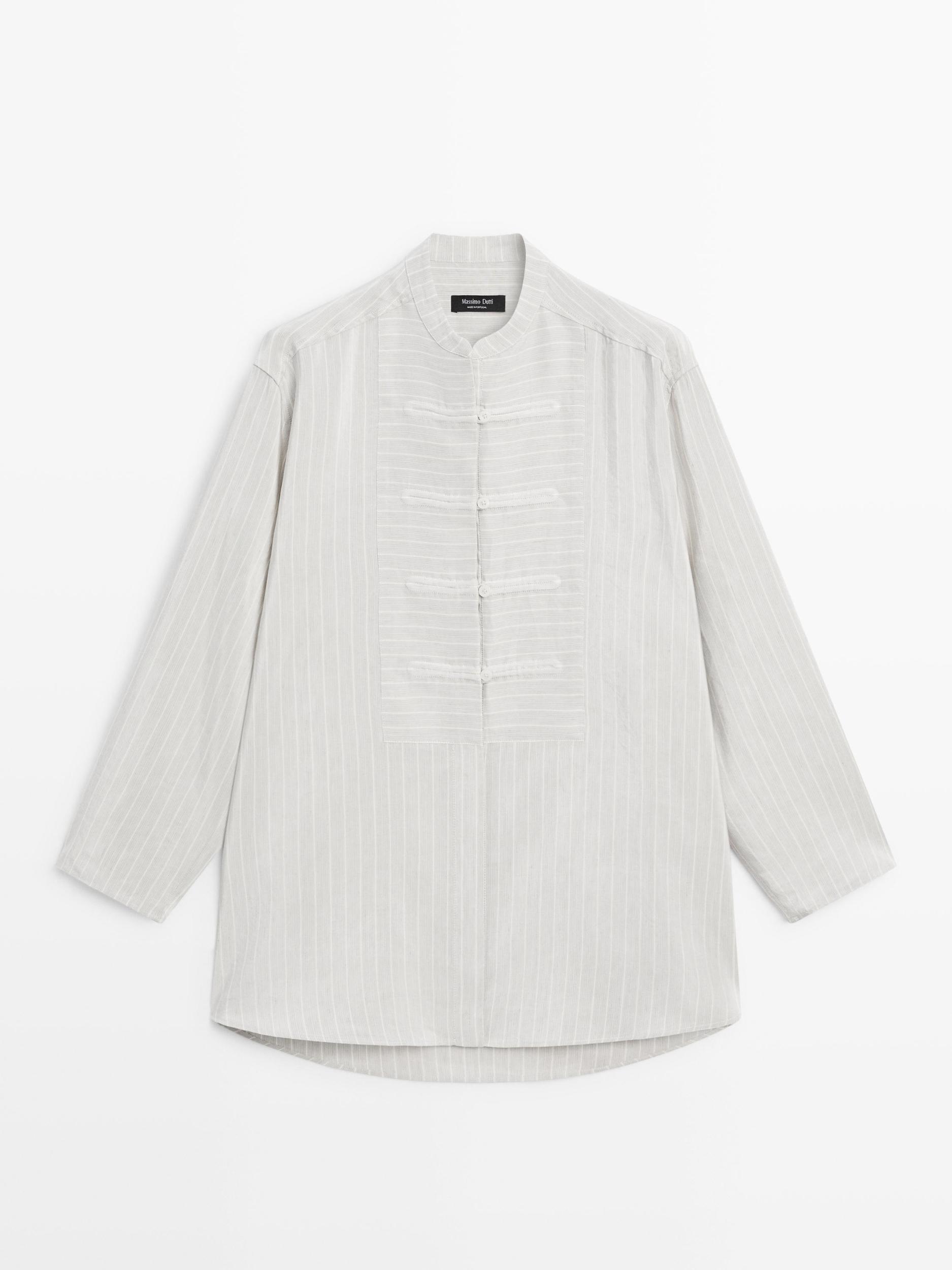 Striped oversize blouse with stand collar Product Image
