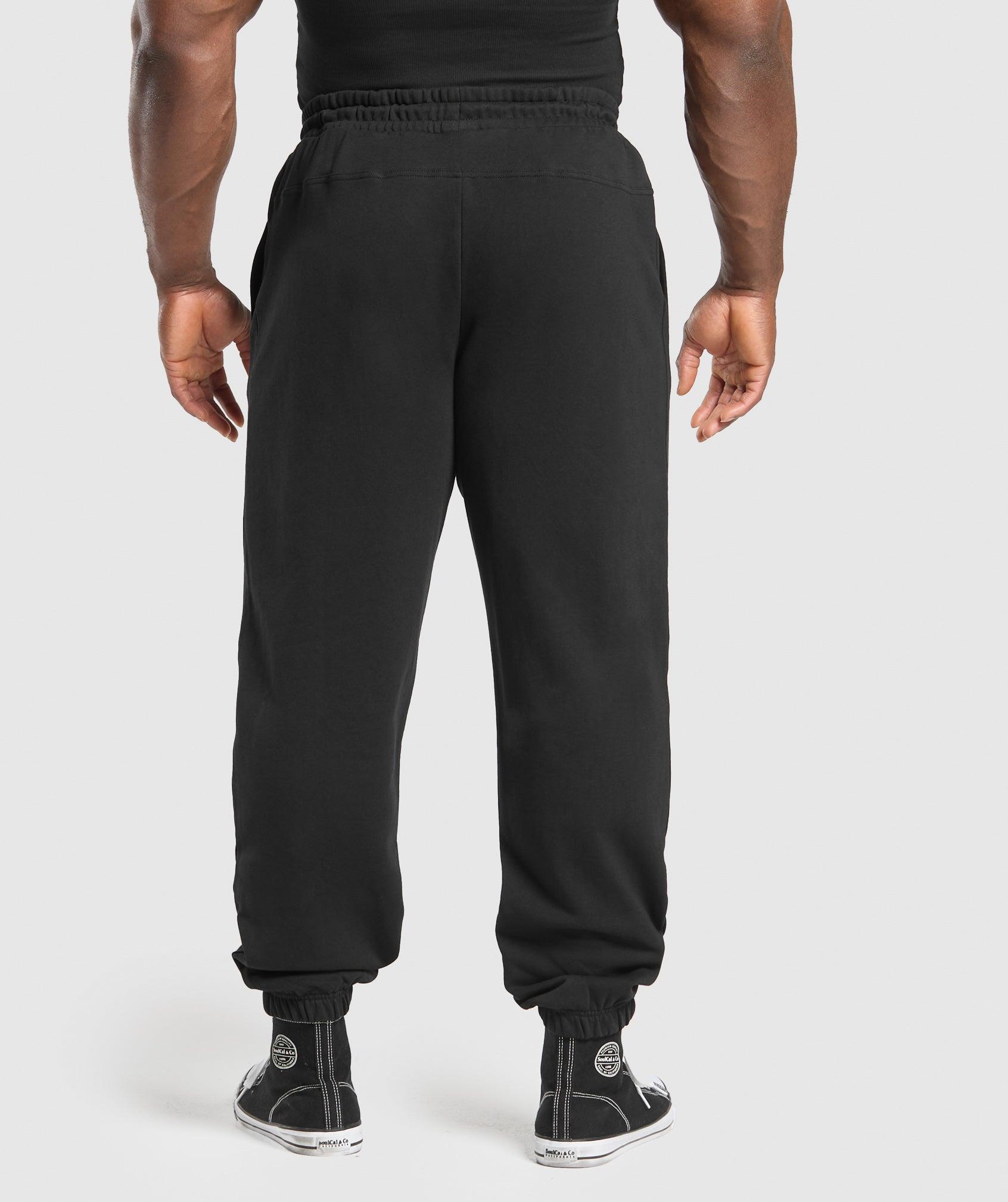 Gymshark Global Lifting Oversized Essential Joggers - Black/Conditioning Red Male Product Image