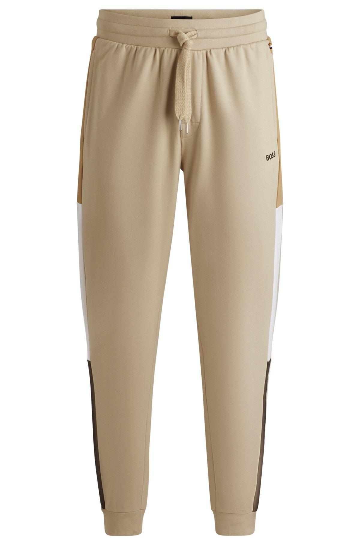 Cotton-terry tracksuit bottoms with contrast side panels Product Image