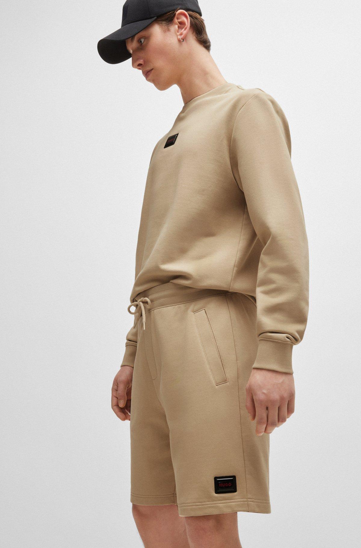 Cotton-terry relaxed-fit shorts with logo trim Product Image