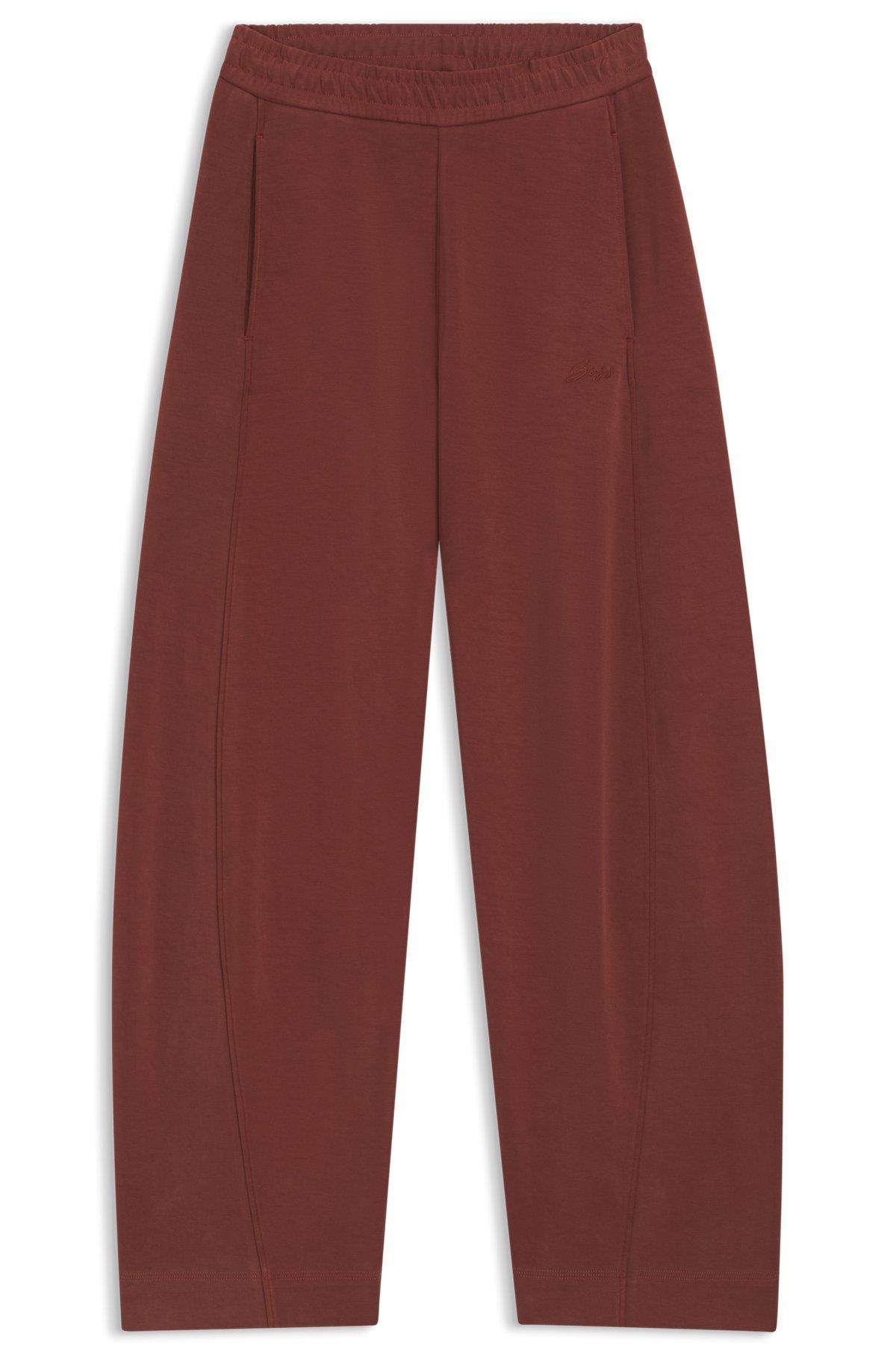 Logo-embroidery tracksuit bottoms with balloon fit Product Image