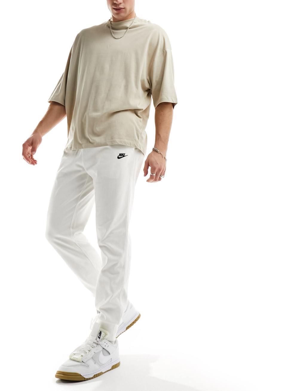 Nike Club Knit sweatpants in off white  Product Image
