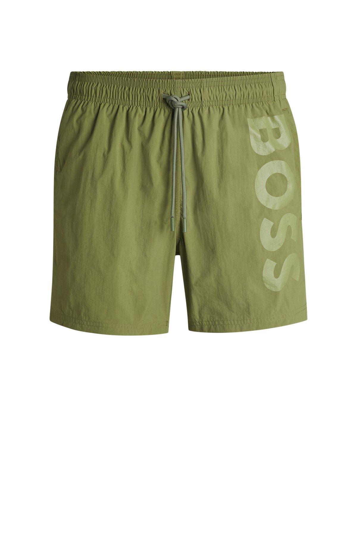Quick-dry swim shorts with vertical logo print Product Image