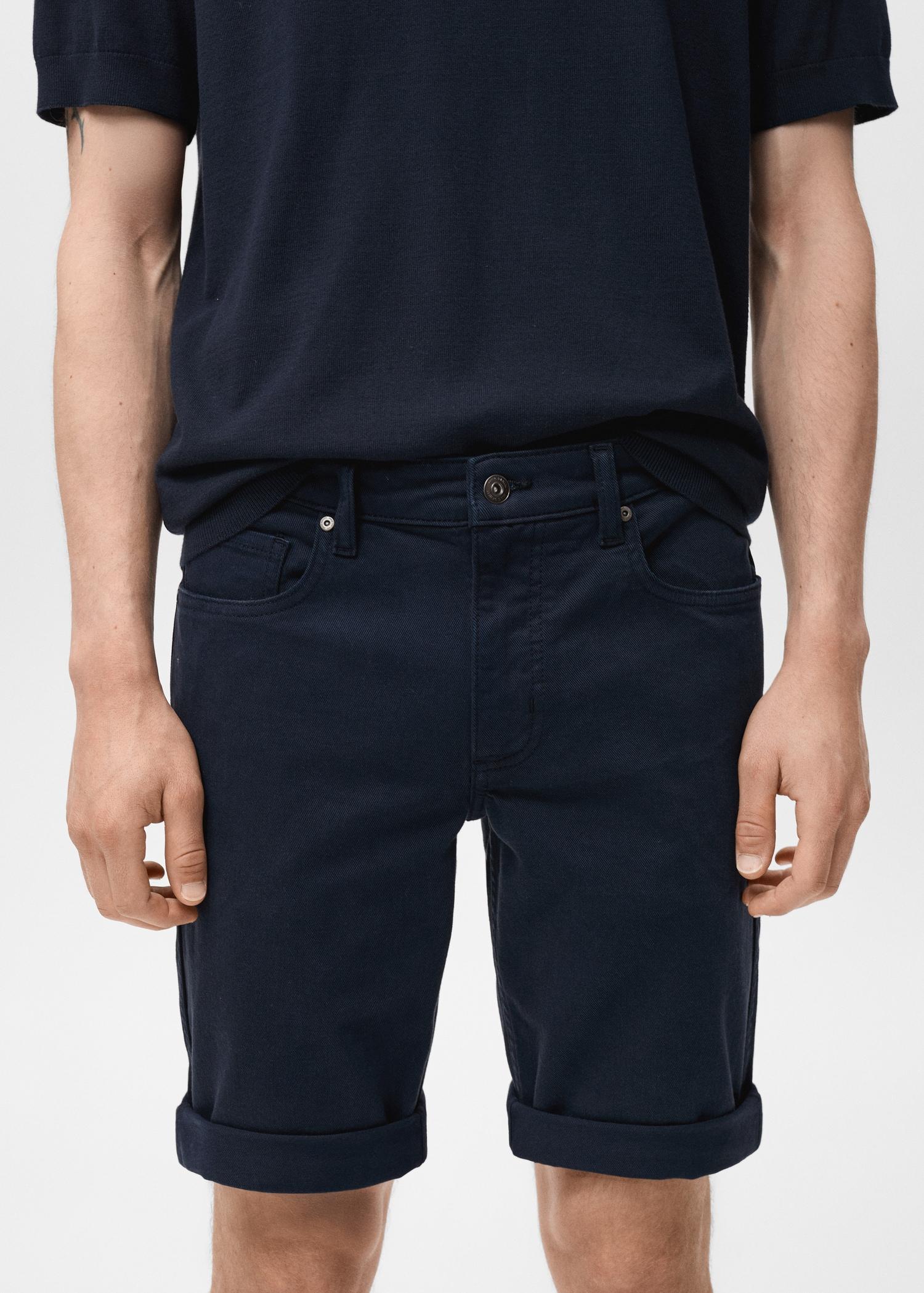 Slim-fit denim bermuda shorts - Men | MANGO USA Product Image