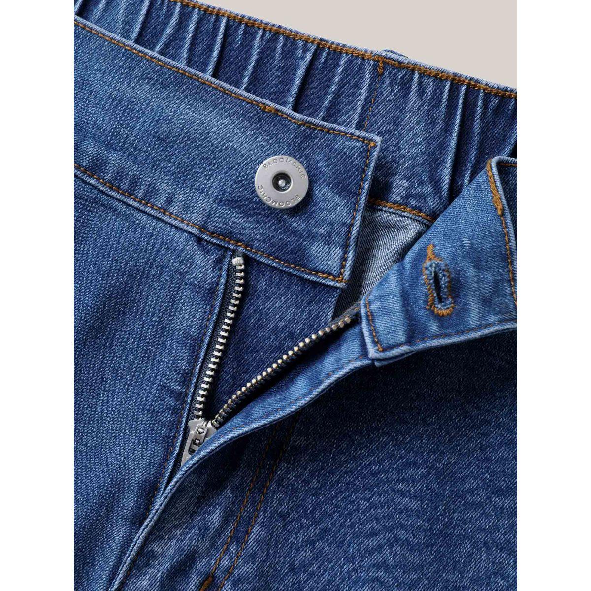 Plus Size Wrap Front Button Detail Denim Skort Women Midblue Overlapping Medium stretch Everyday-Casual Slanted pocket Denim Shorts BloomChic 18/2X Product Image