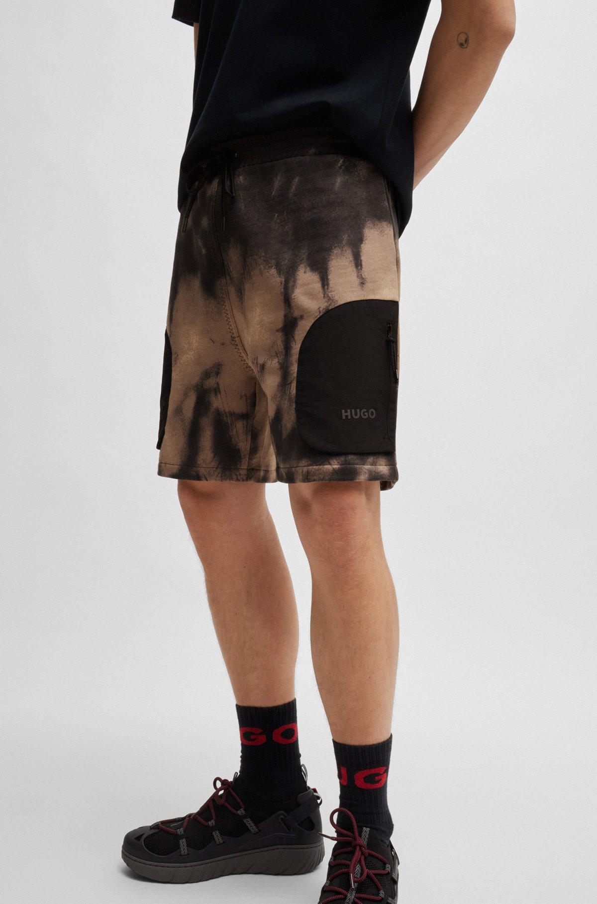 Cotton-terry relaxed-fit shorts with logo print Product Image